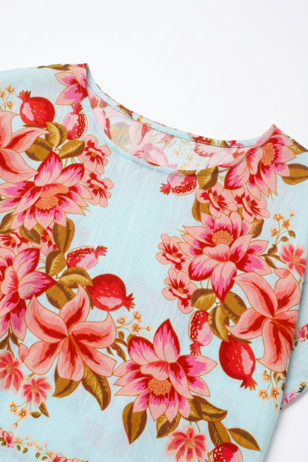 Top de corte em tecido boxy azul claro com estampado floral leve