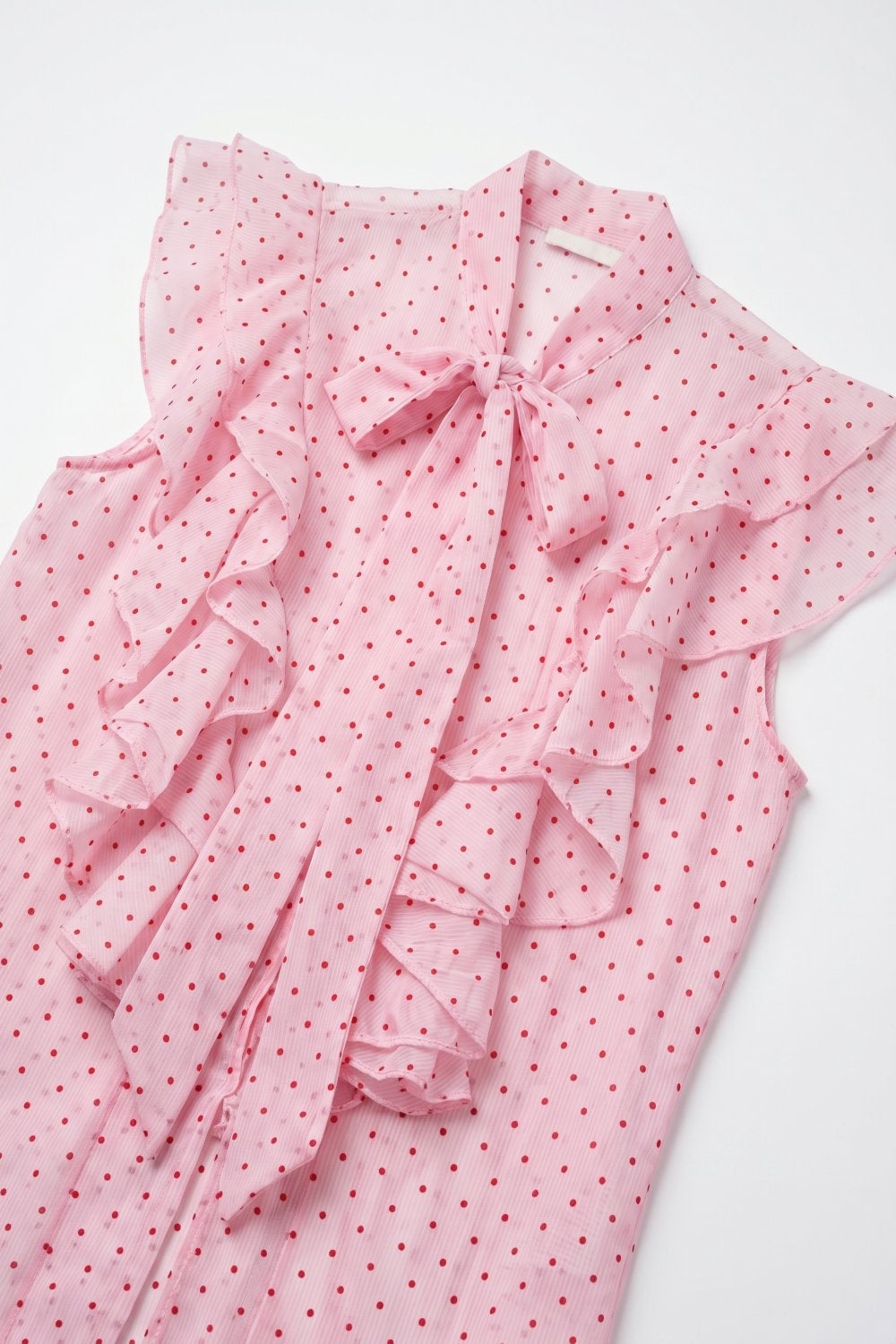 Blusa sem mangas com laço babados e estampa de bolinhas em chiffon rosa claro