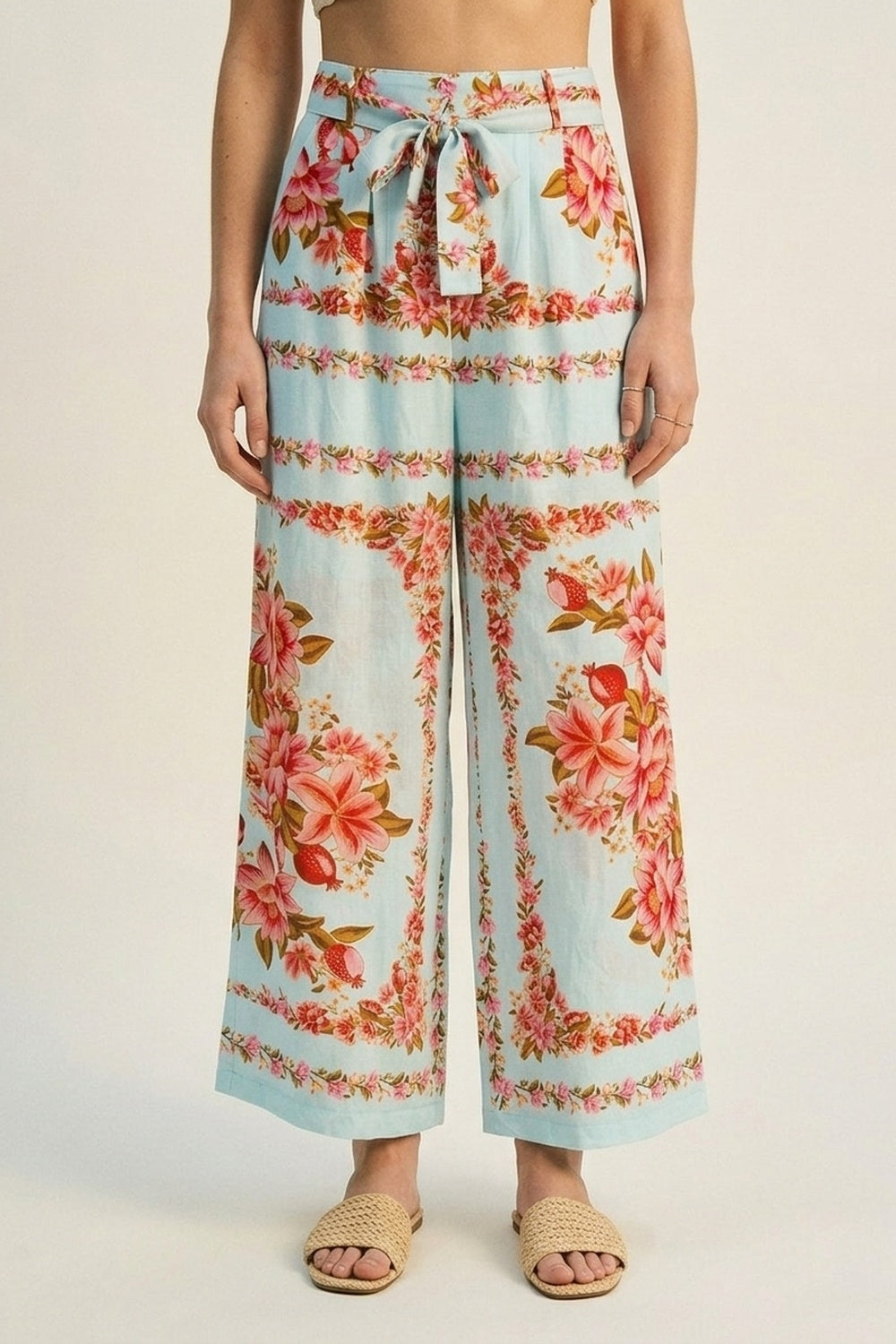 Calças de cintura larga de algodão com estampado floral azul claro