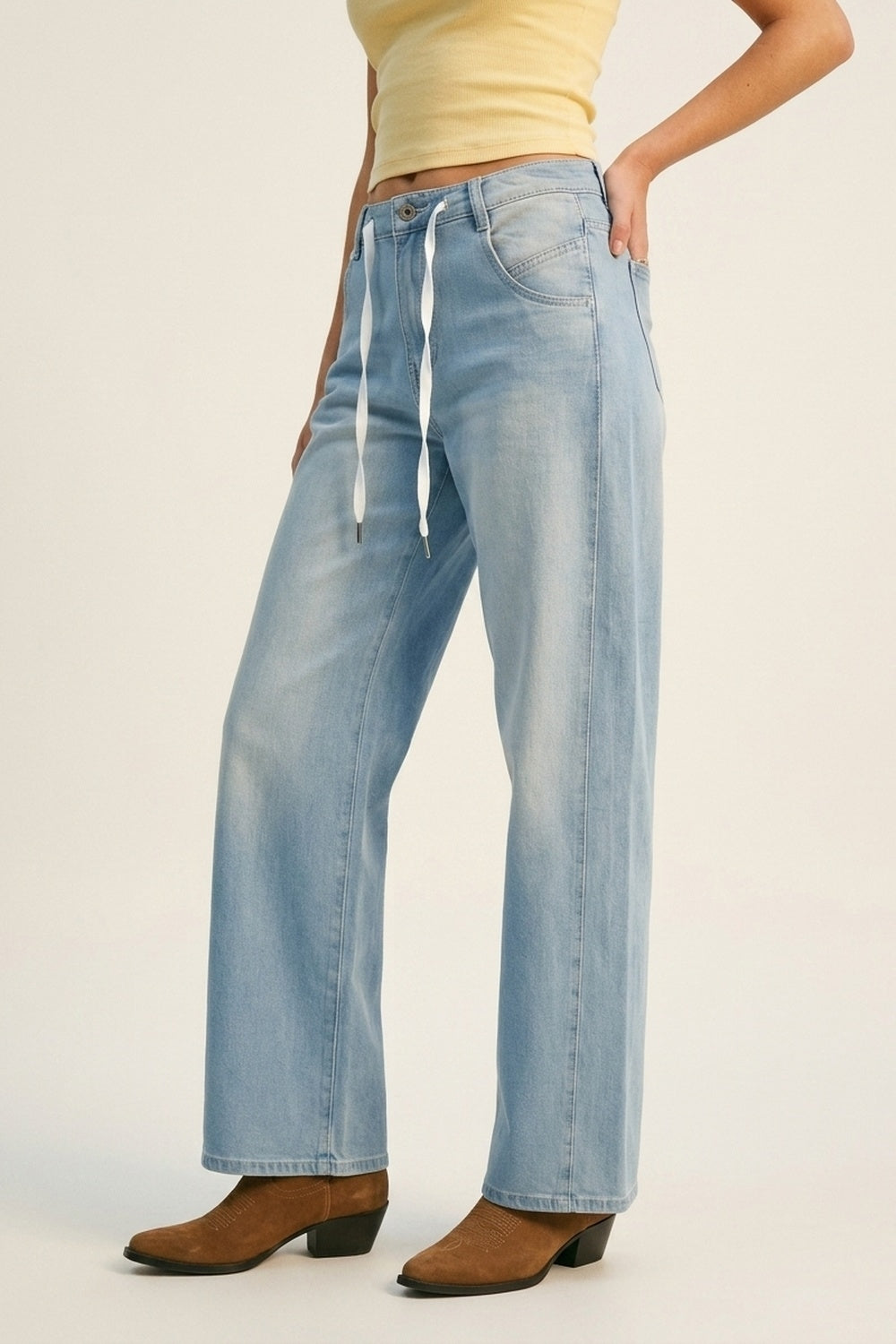 Calças Jeans Relaxadas Ajustáveis em Azul Claro