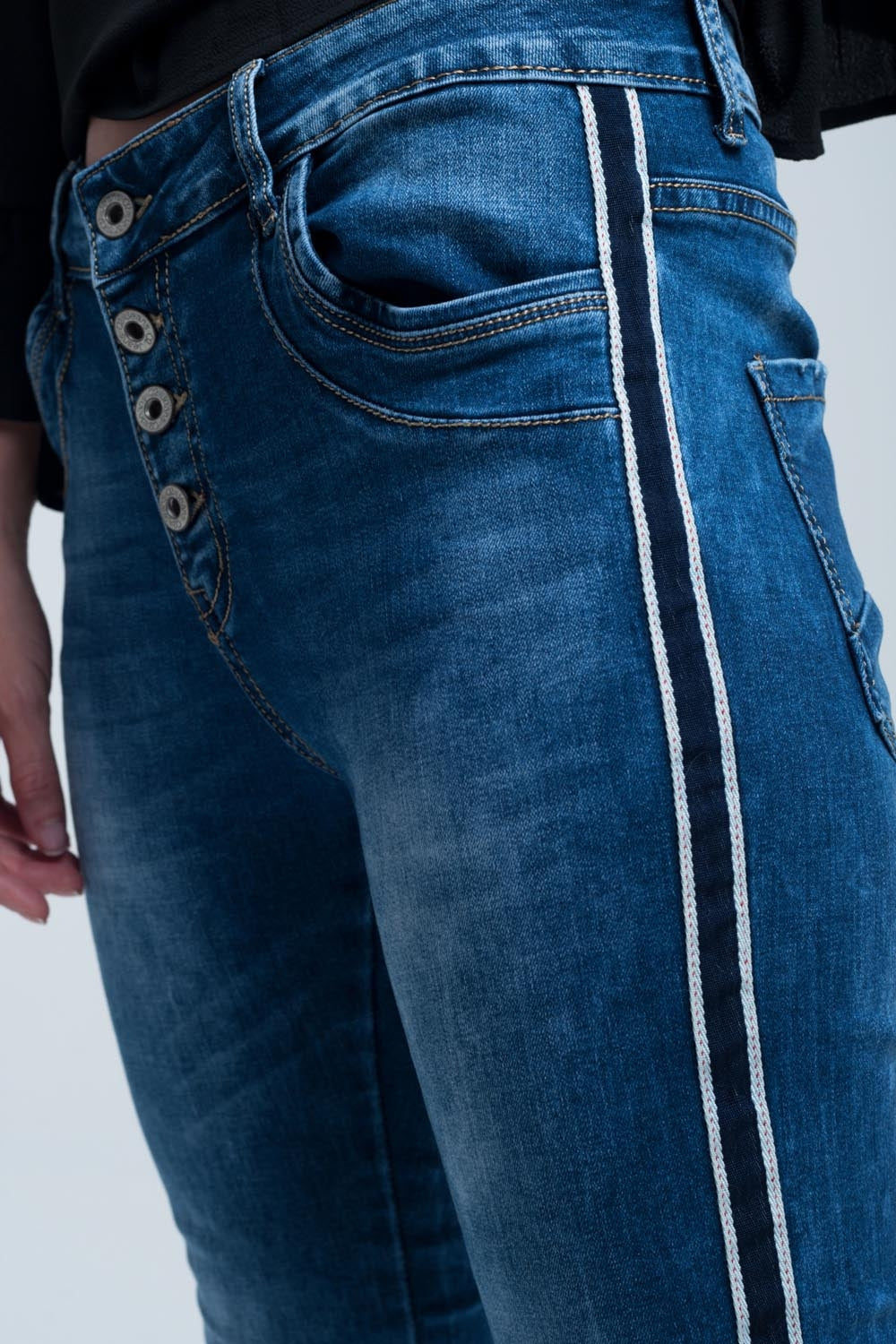 Vaqueiro skinny com listras ao lado