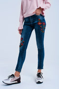 Calças de ganga skinny com flores