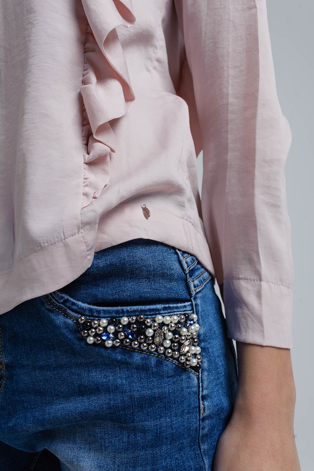 Top com detalhe de ruffle em rosa pálido