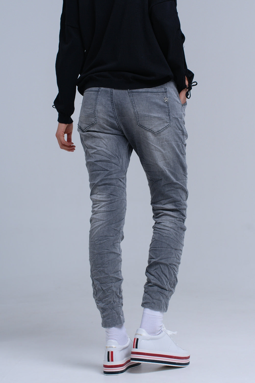 Calça jeans basculante