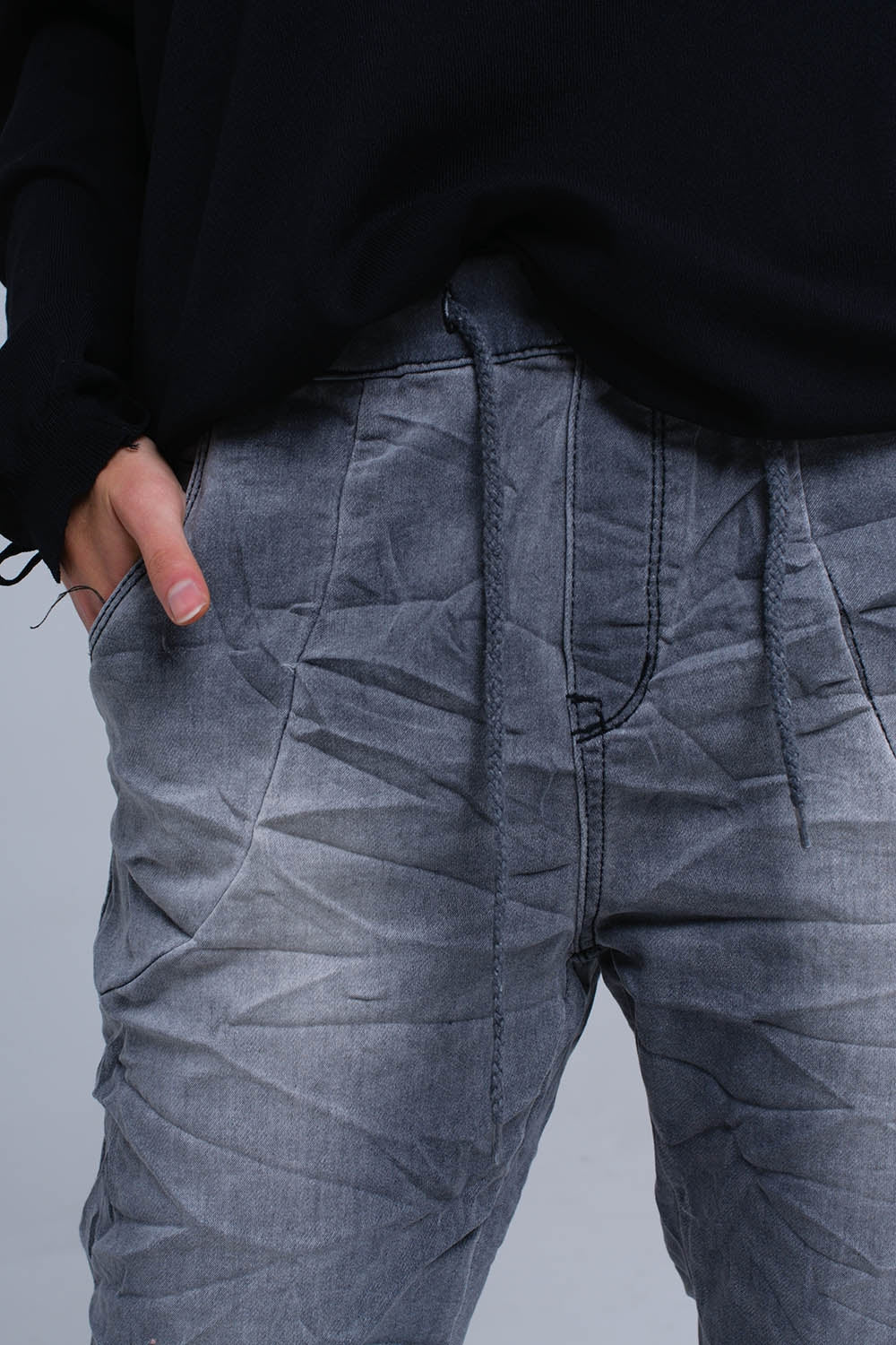 Calça jeans basculante