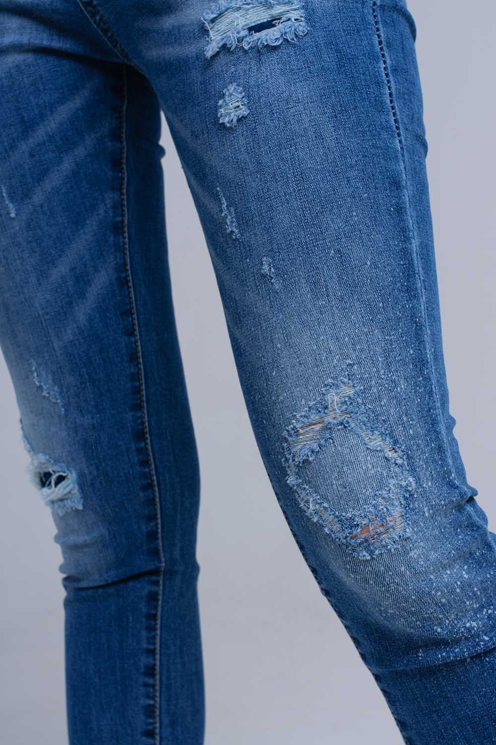 Calças de ganga skinny e desgastado com franjas
