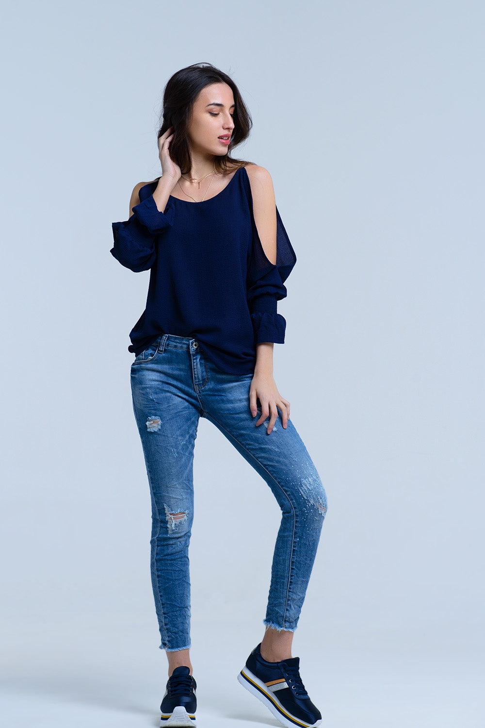 Jeans com detalhes de rips