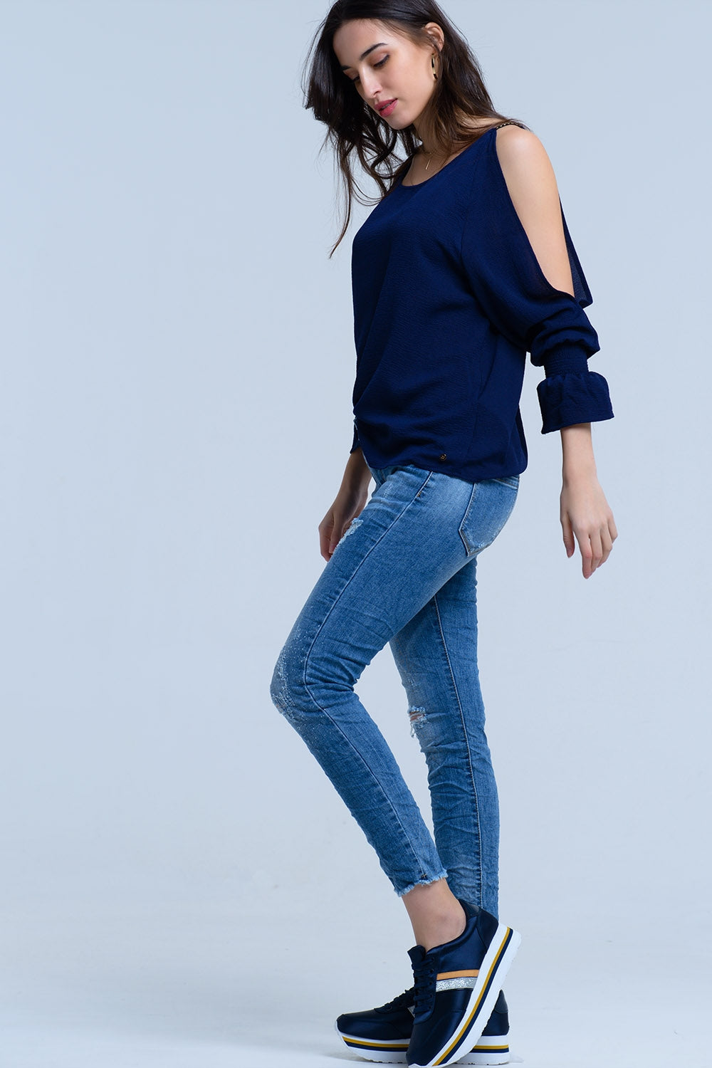 Jeans com detalhes de rips