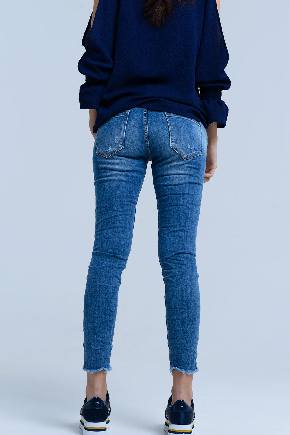 Jeans com detalhes de rips