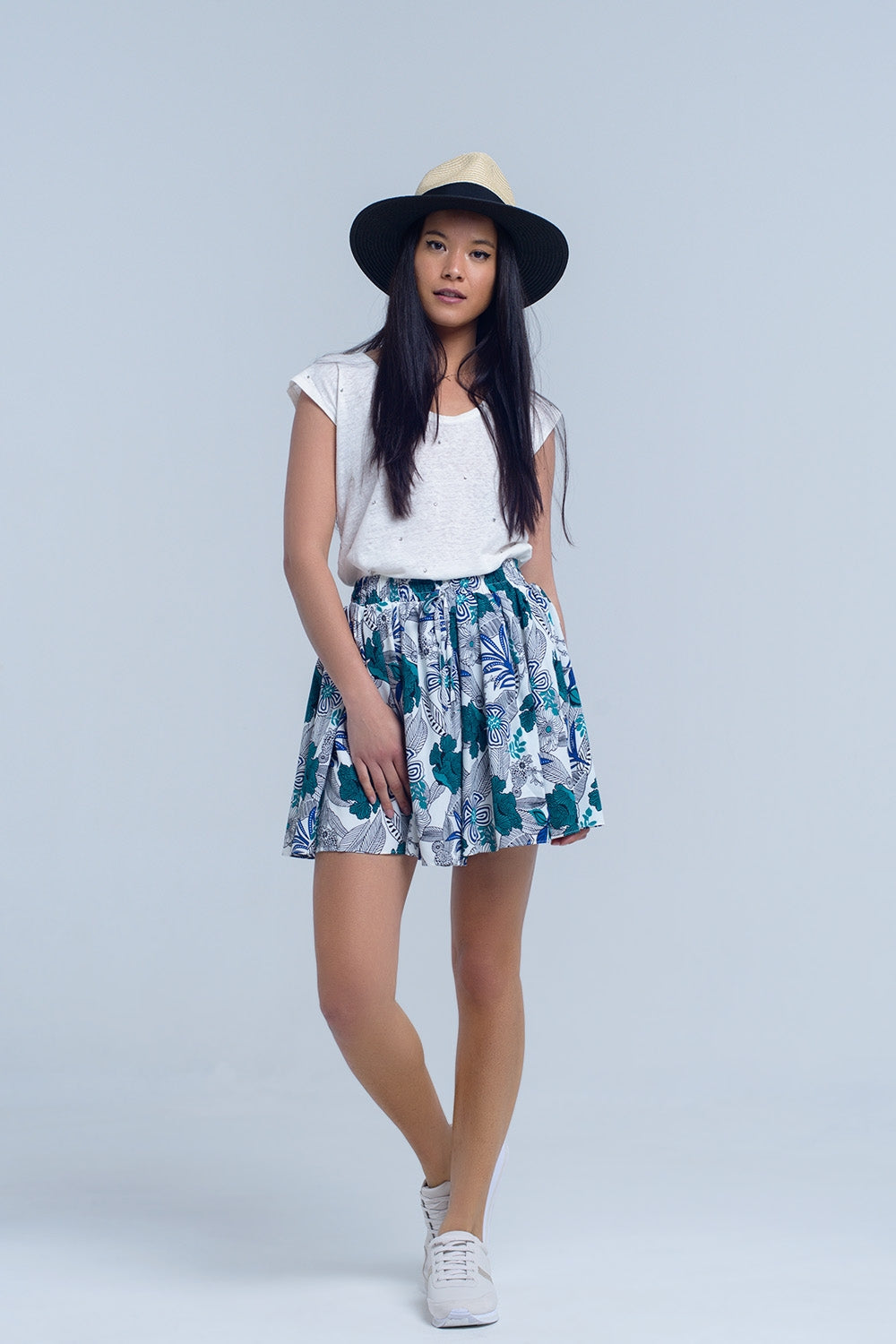 Mini skorts azul com impressão floral