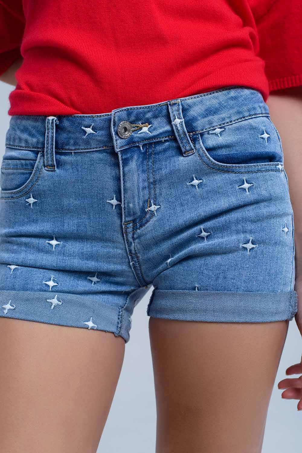 Calções jeans com detalhes das estrelas