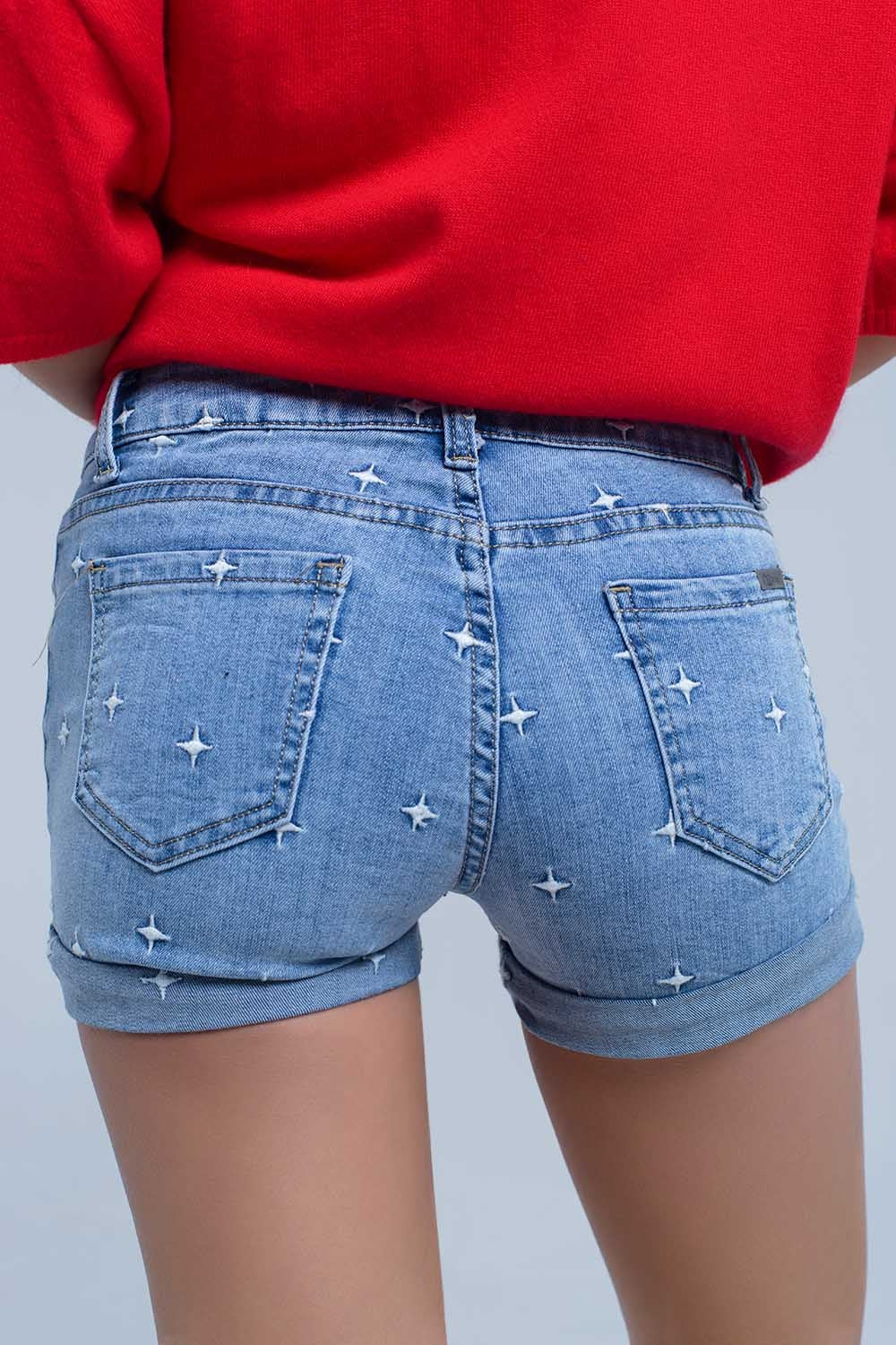 Calções jeans com detalhes das estrelas