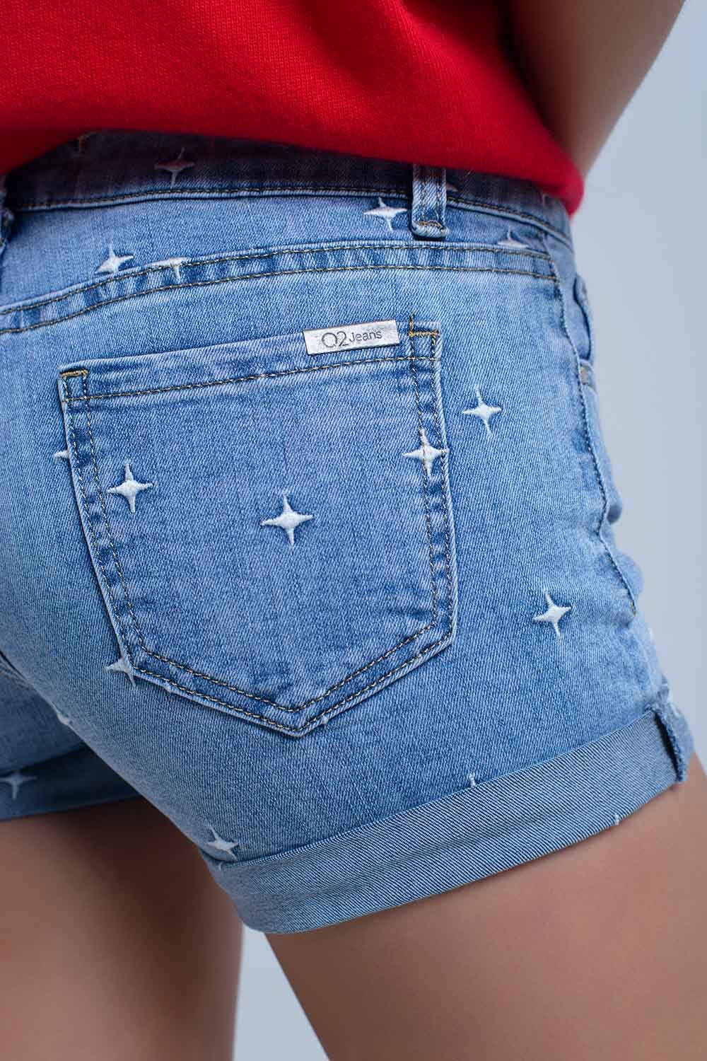 Calções jeans com detalhes das estrelas