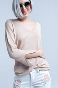 Camisola de malha cor-de-rosa com detalhes dourados em lurex