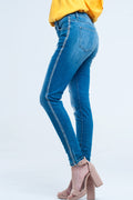 Calça jeans skinny com rasgos e glitter