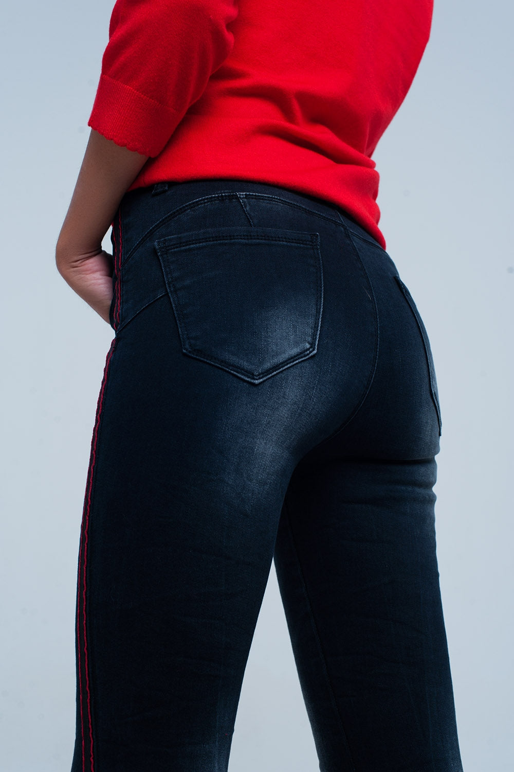 Calças de ganga skinny com listras vermelhas do lado
