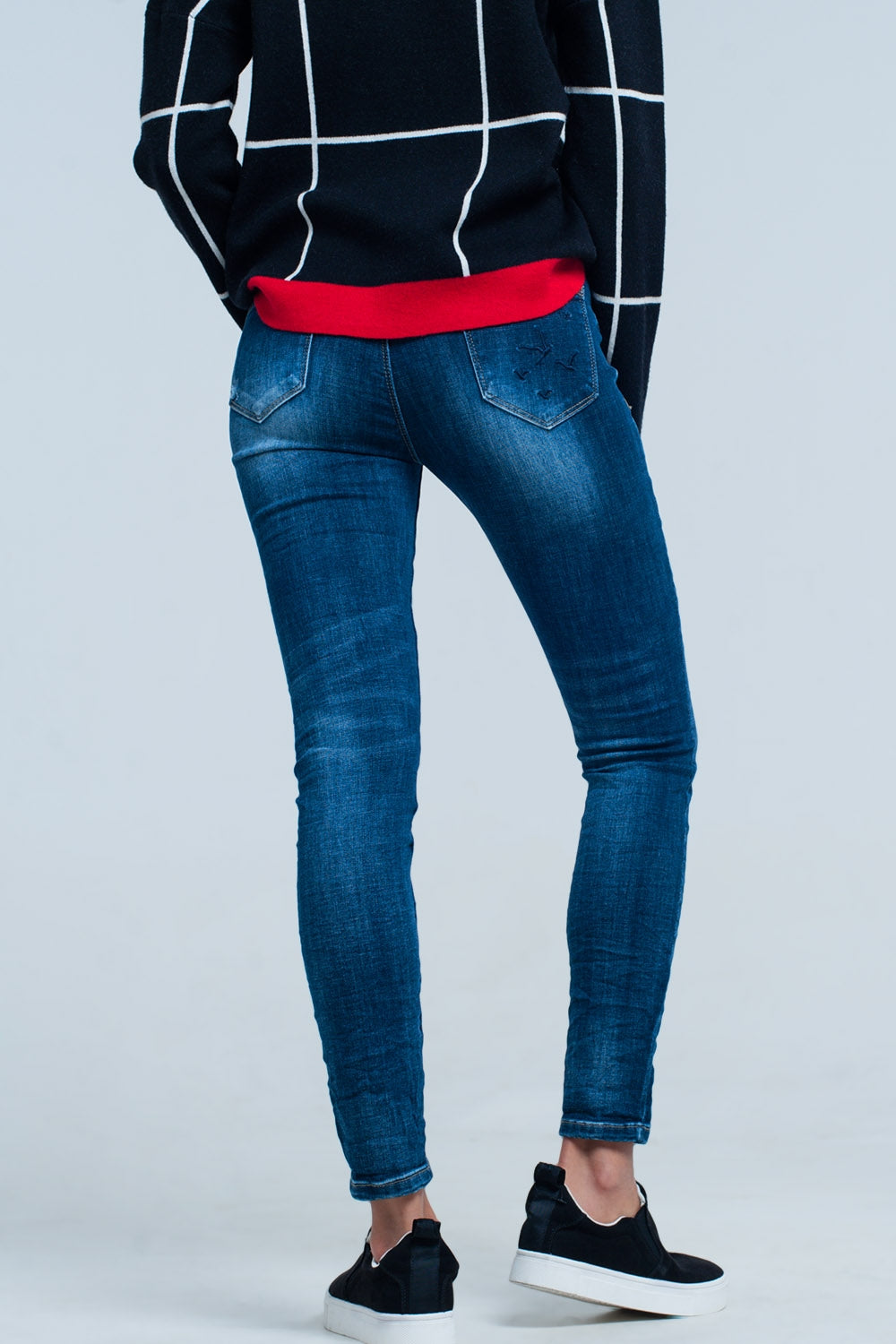 Calças de ganga skinny com detalhadas bordado no bolso