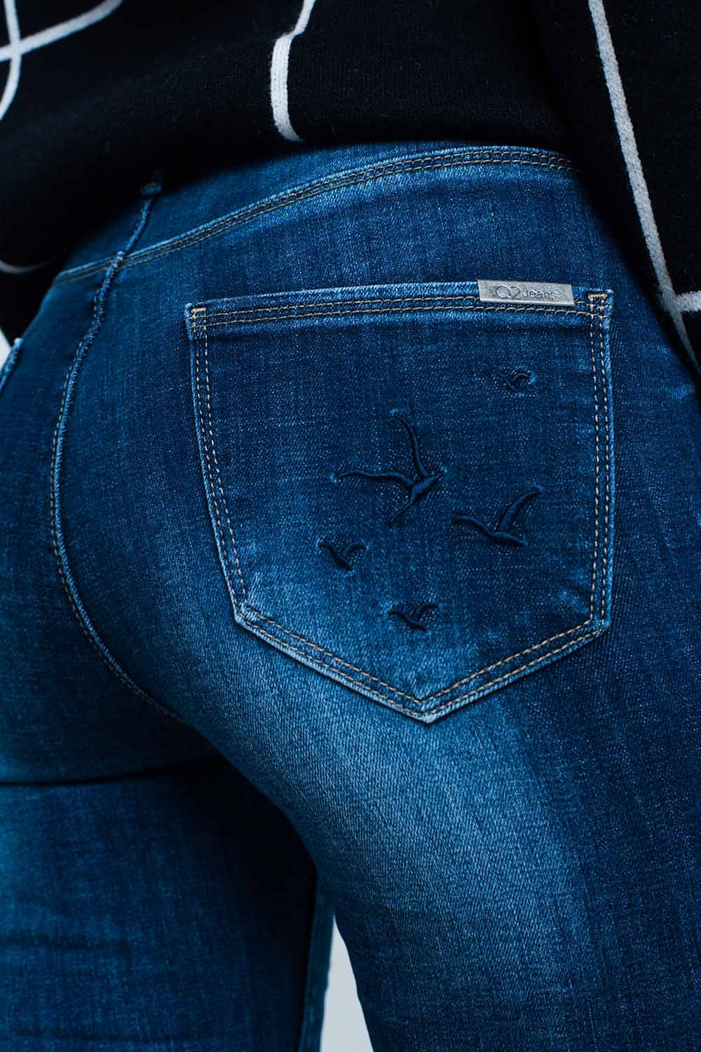 Calças de ganga skinny com detalhadas bordado no bolso