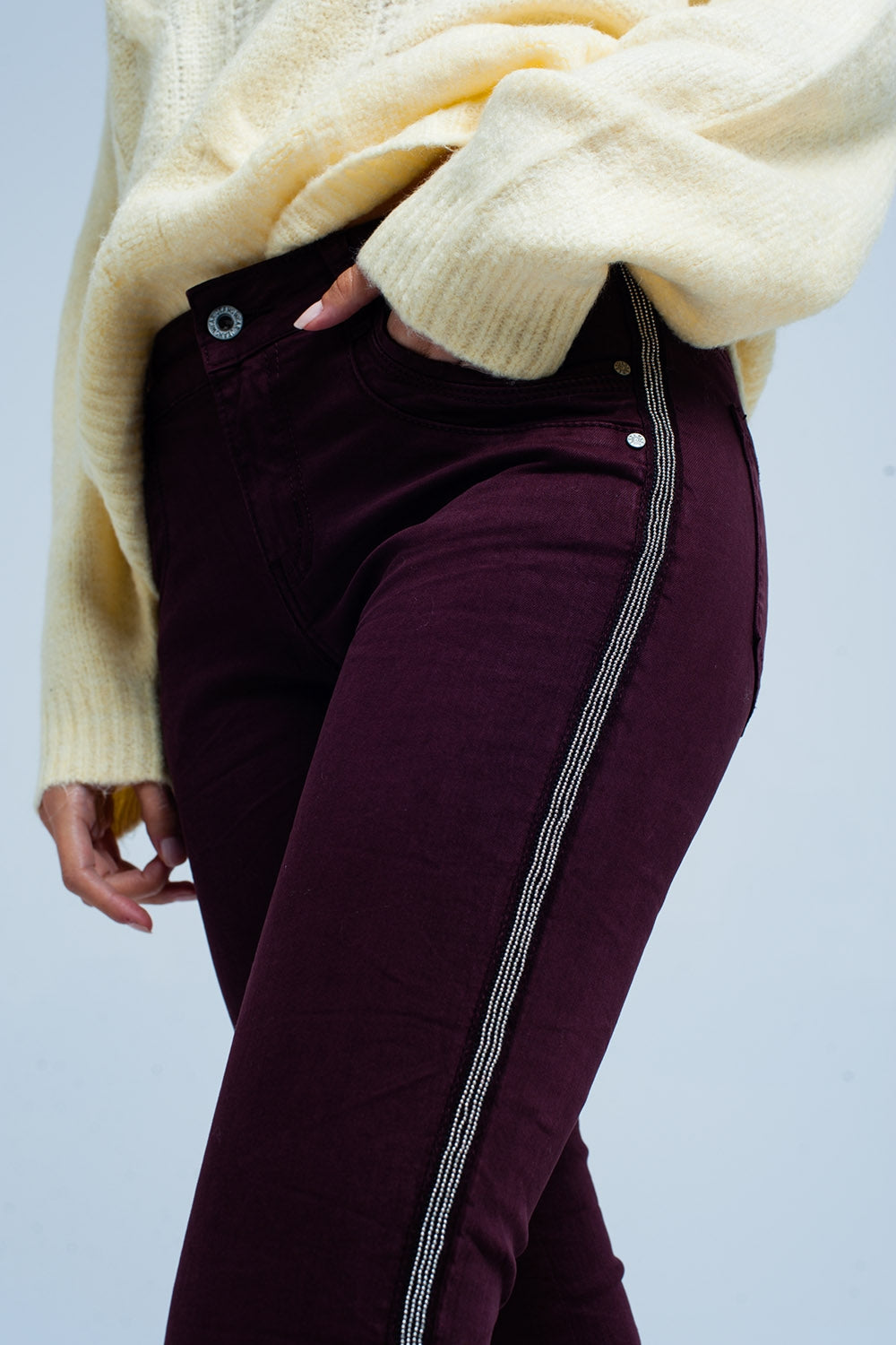 Calças de ganga skinny com listra lateral de metal
