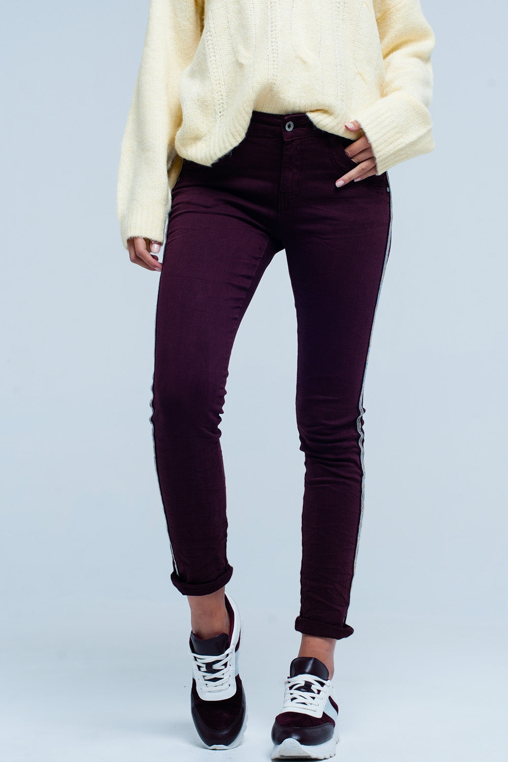 Calças de ganga skinny com listra lateral de metal