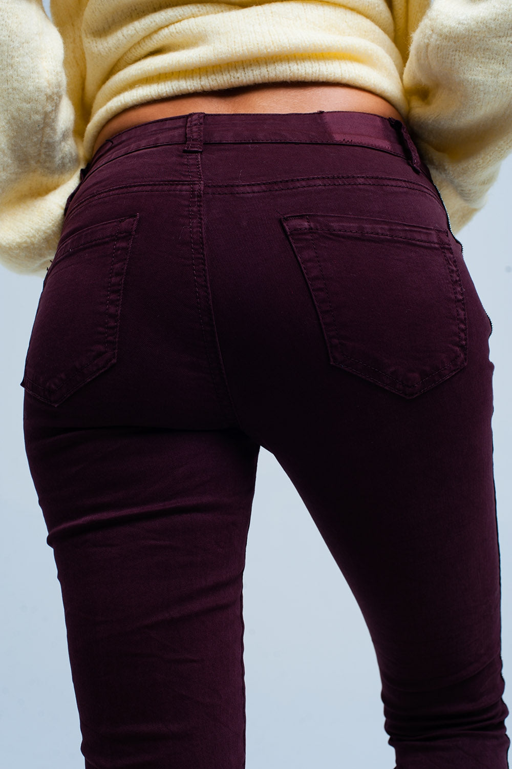 Calças de ganga skinny com listra lateral de metal
