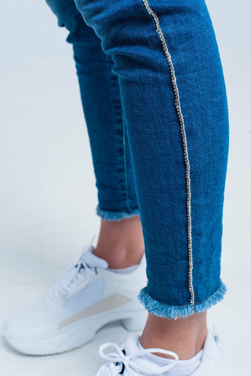 Calças de ganga skinny com listra lateral strass