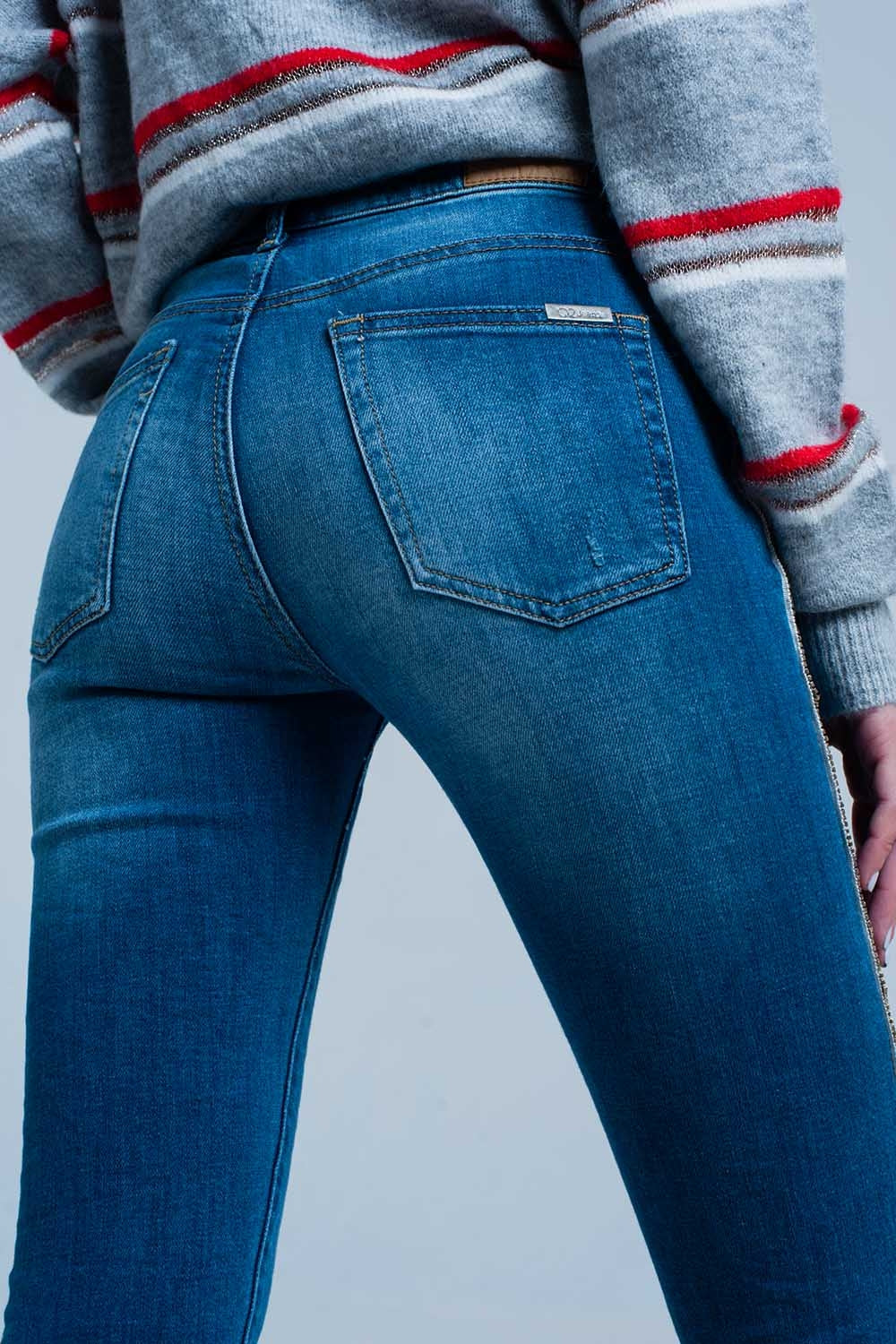 Calças de ganga skinny com listra lateral strass