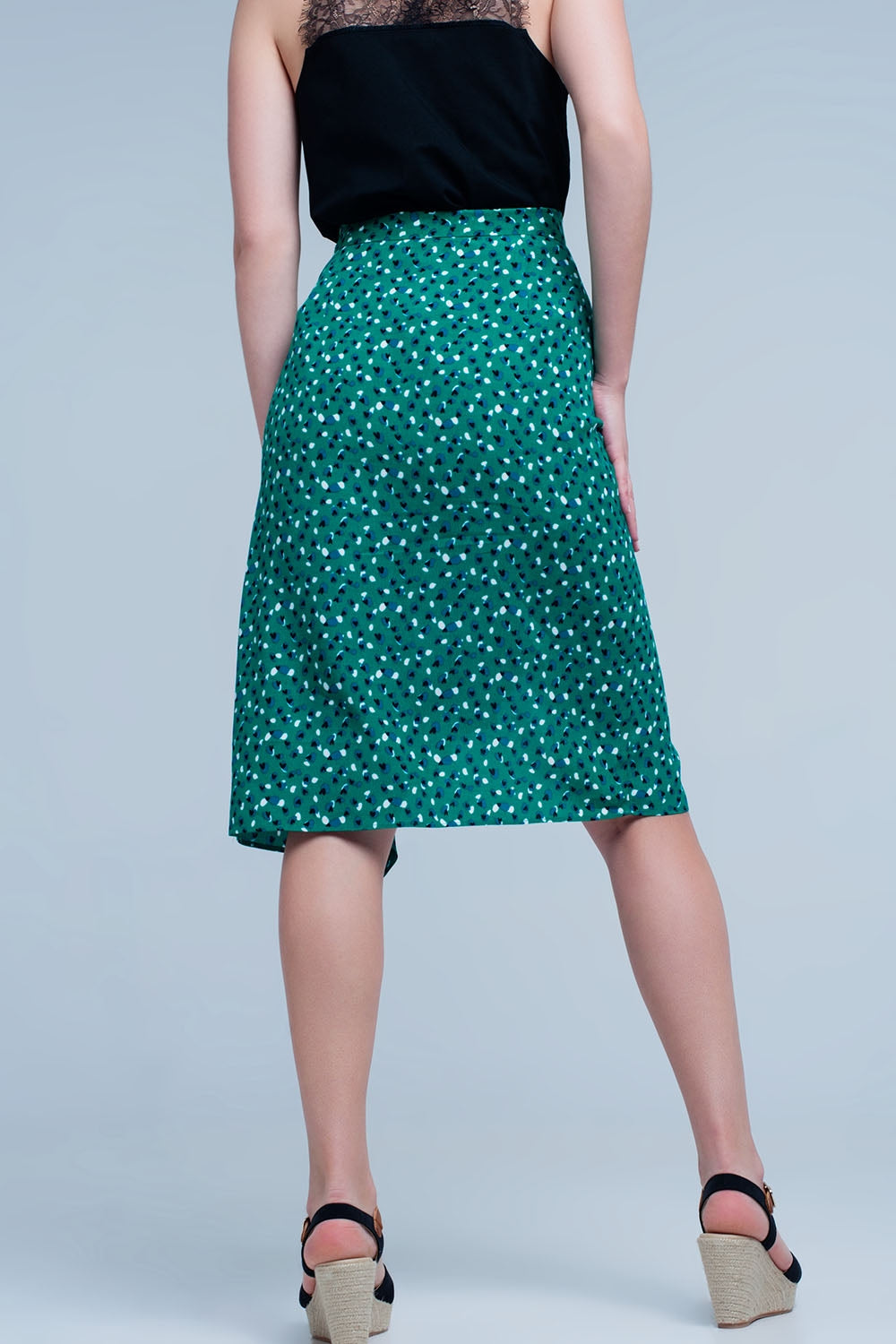 Saia verde Midi com estampa floral de bolinhas e detalhe de plissado