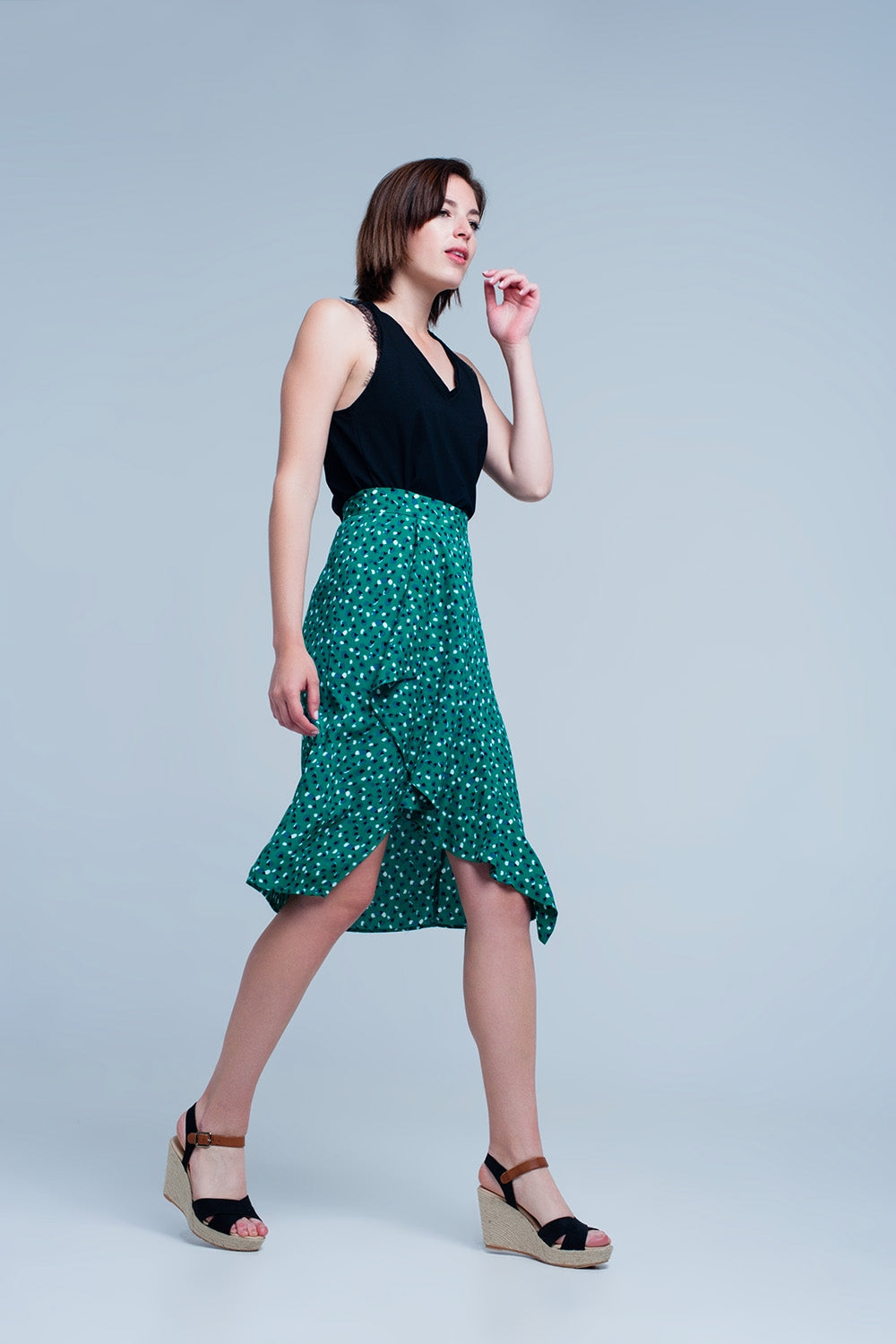 Saia verde Midi com estampa floral de bolinhas e detalhe de plissado