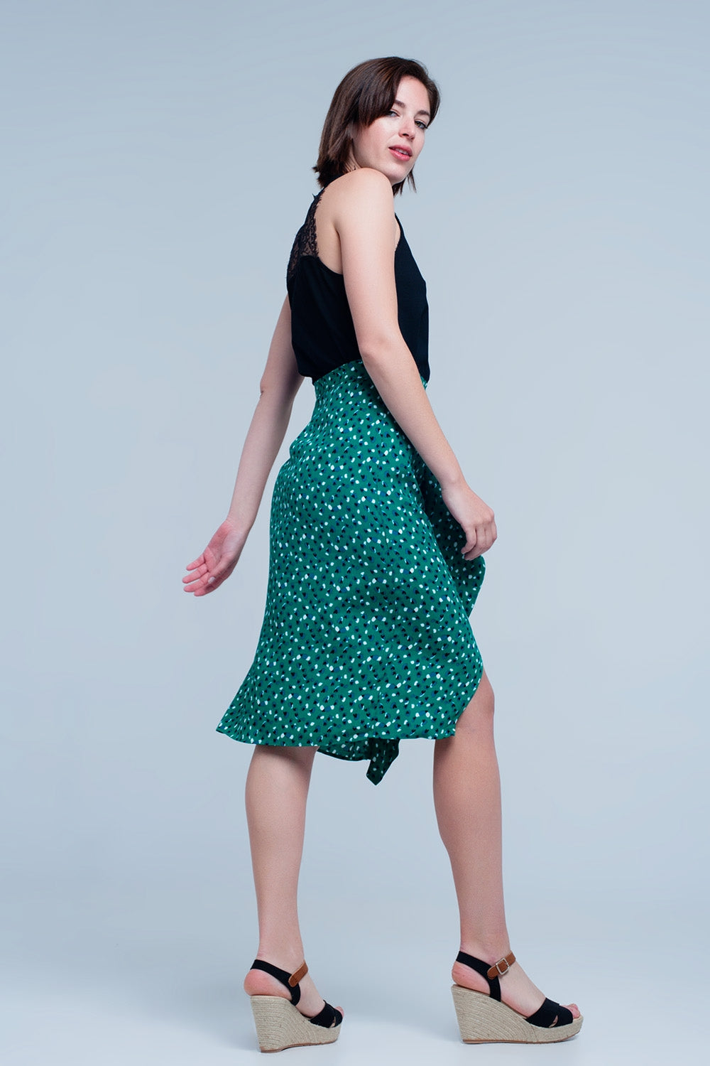 Saia verde Midi com estampa floral de bolinhas e detalhe de plissado