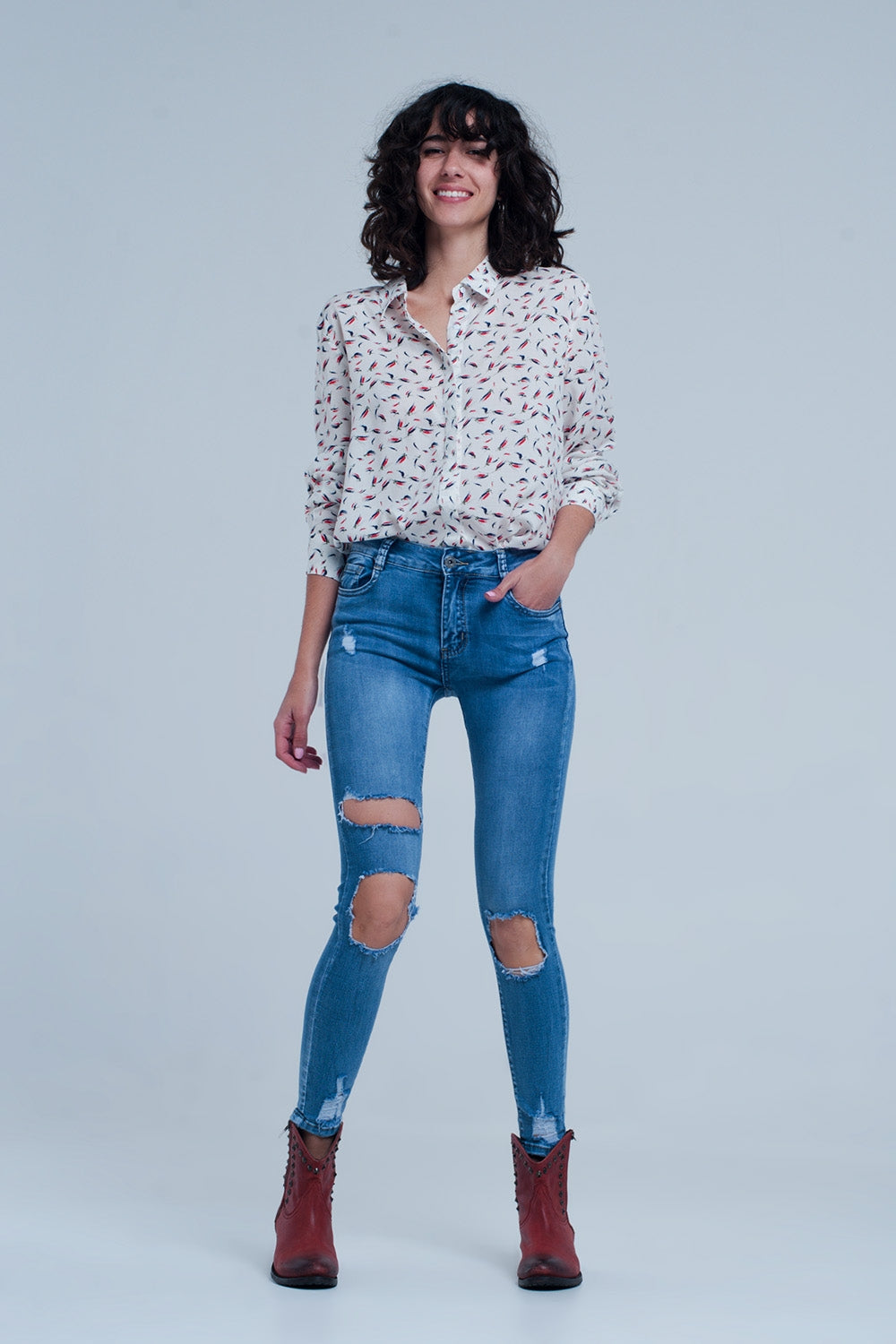 Calças de ganga skinny com rasgos muito desgastados