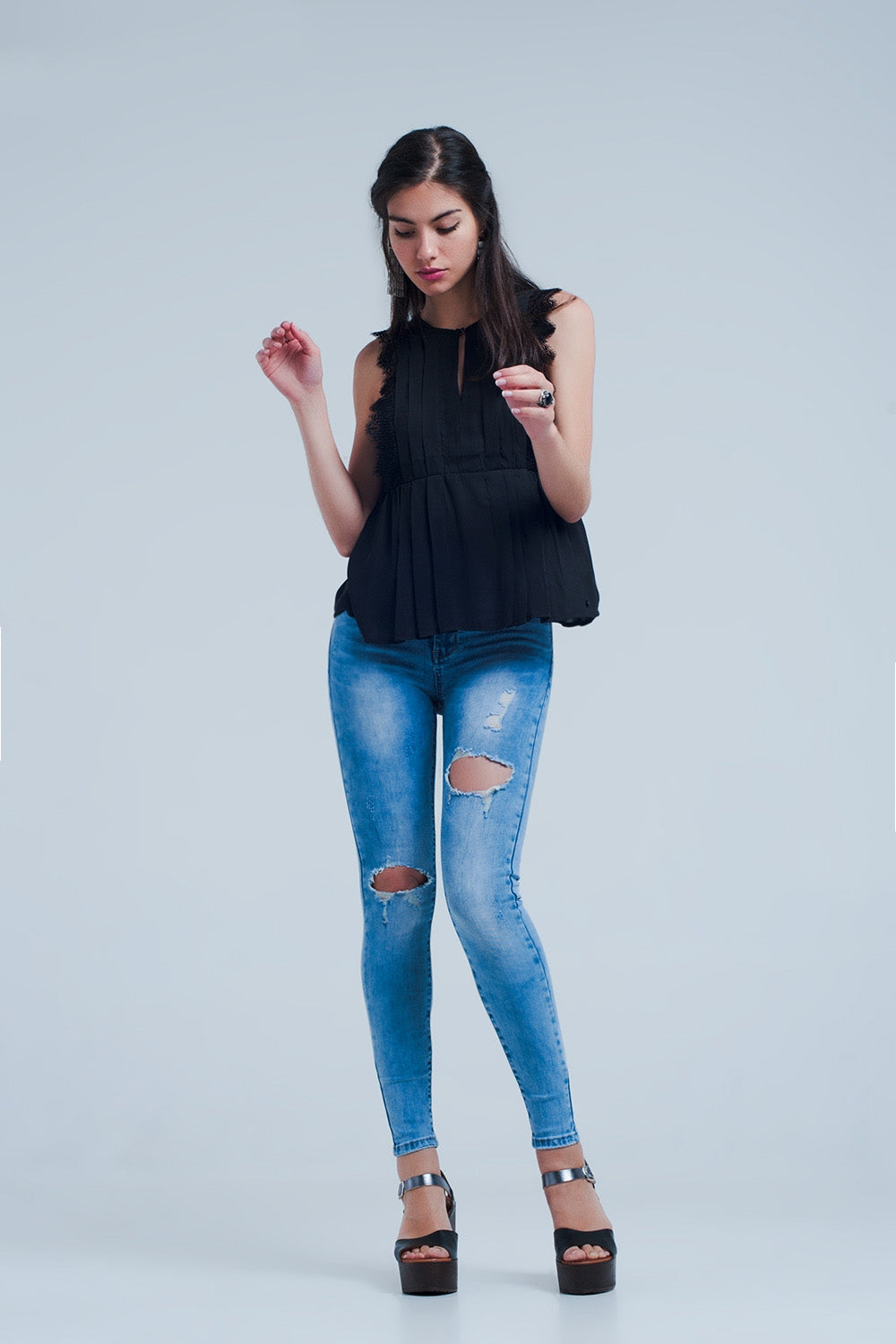 Calças de ganga skinny com efeito desgastado