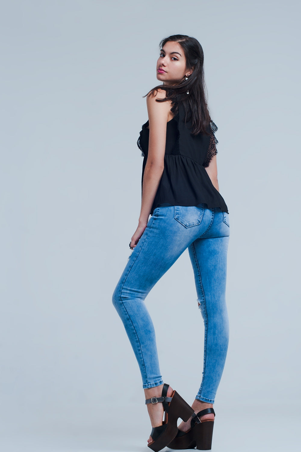 Calças de ganga skinny com efeito desgastado