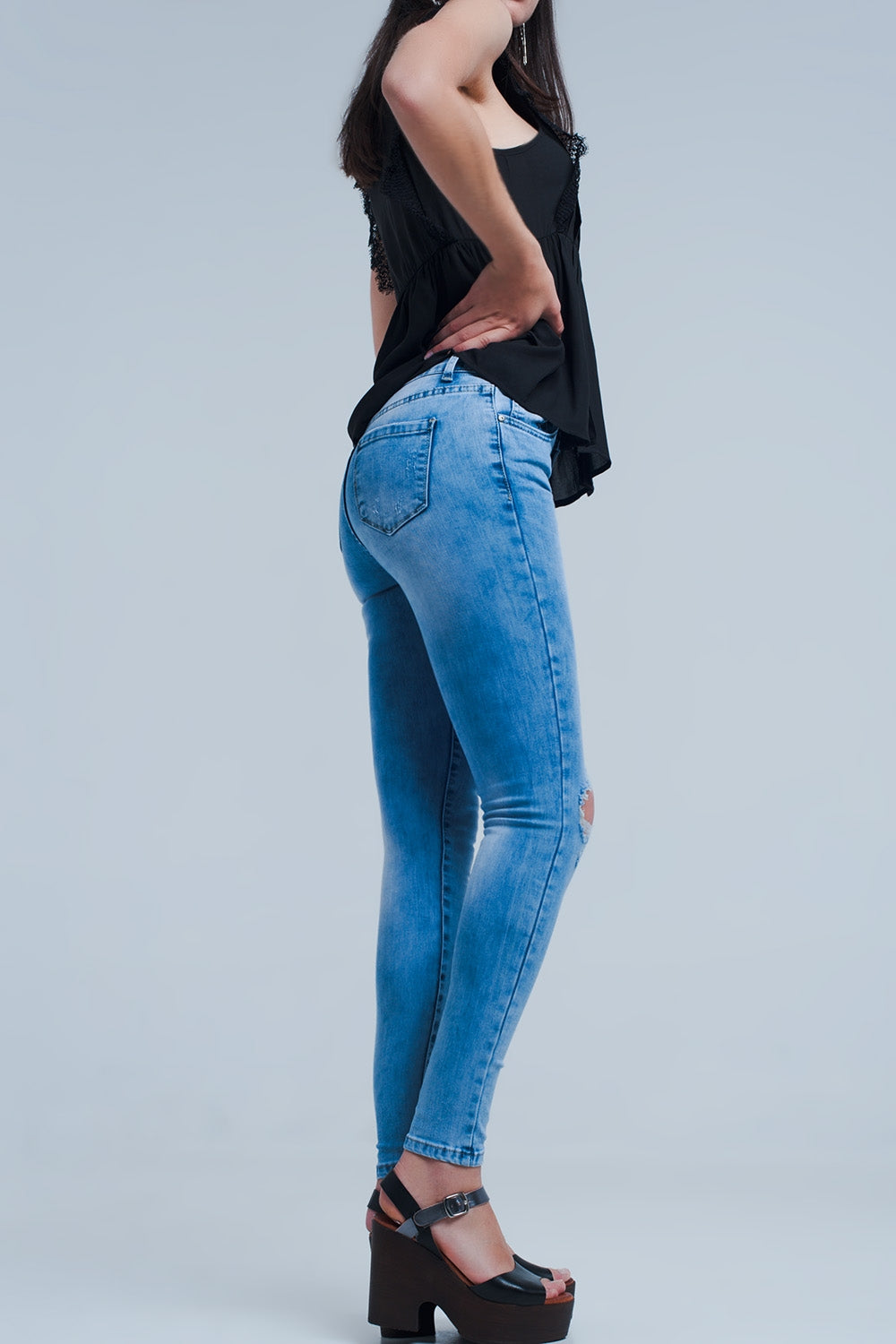 Calças de ganga skinny com efeito desgastado