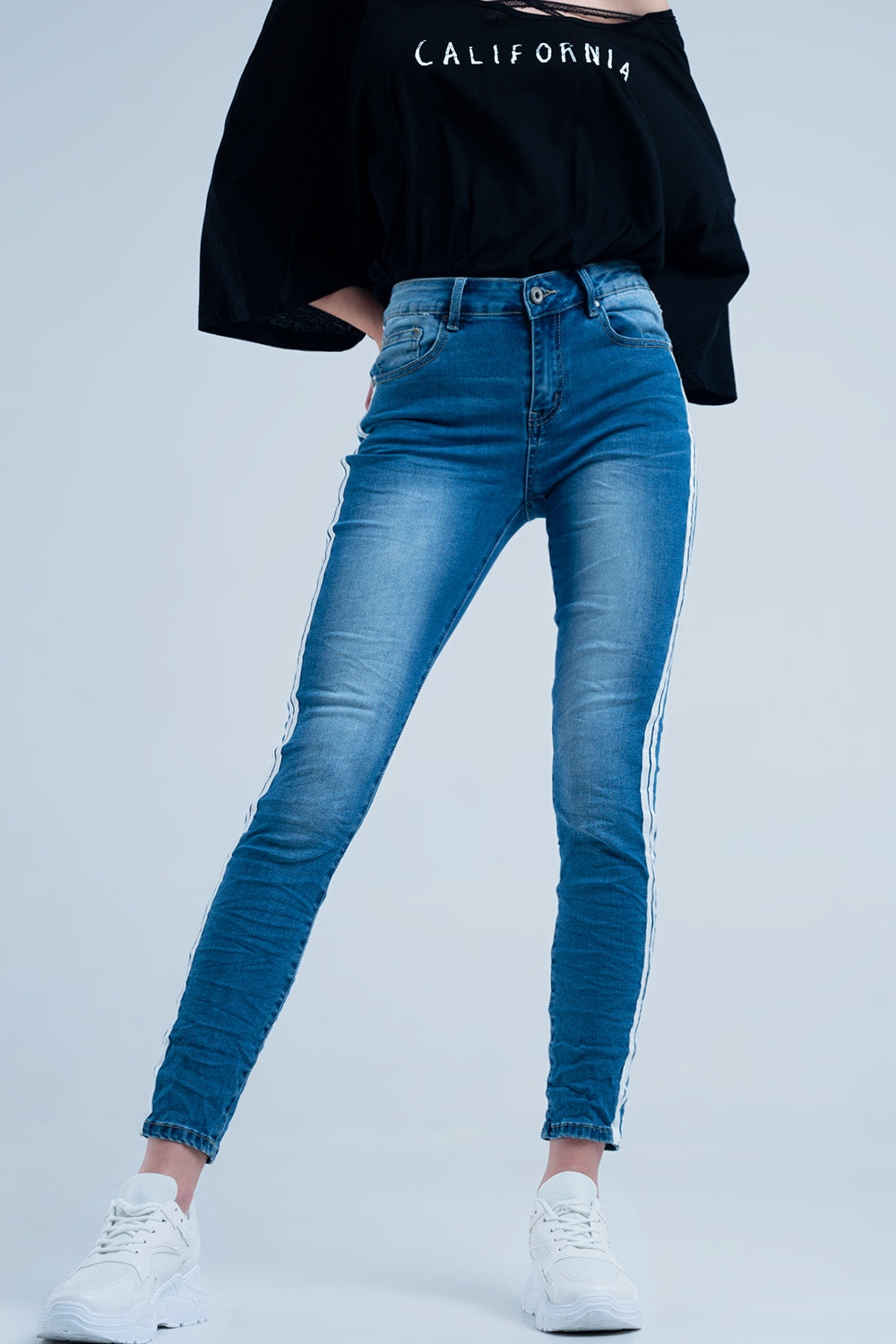 Calças de ganga skinny com listras na costura lateral