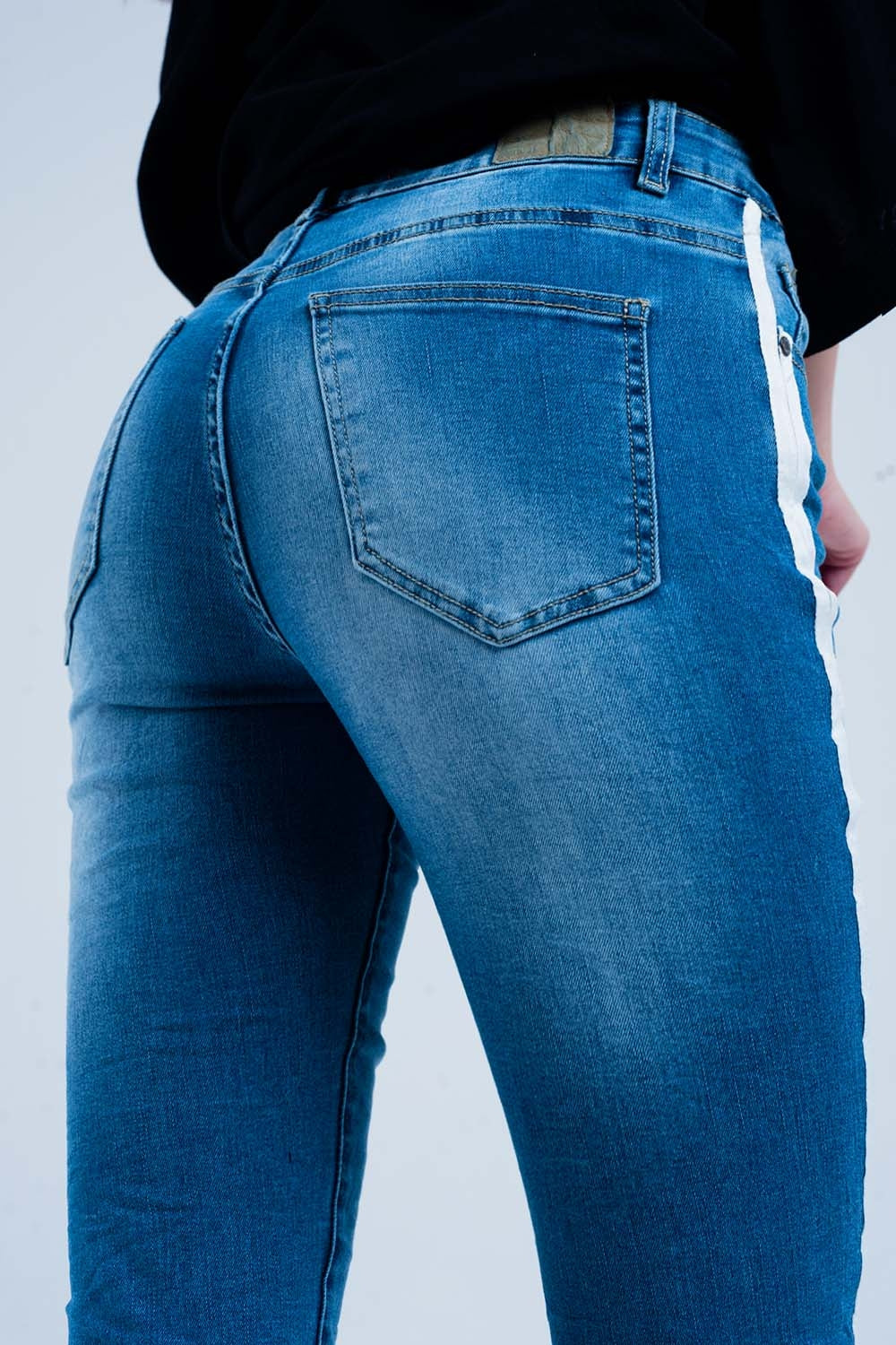 Calças de ganga skinny com listras na costura lateral