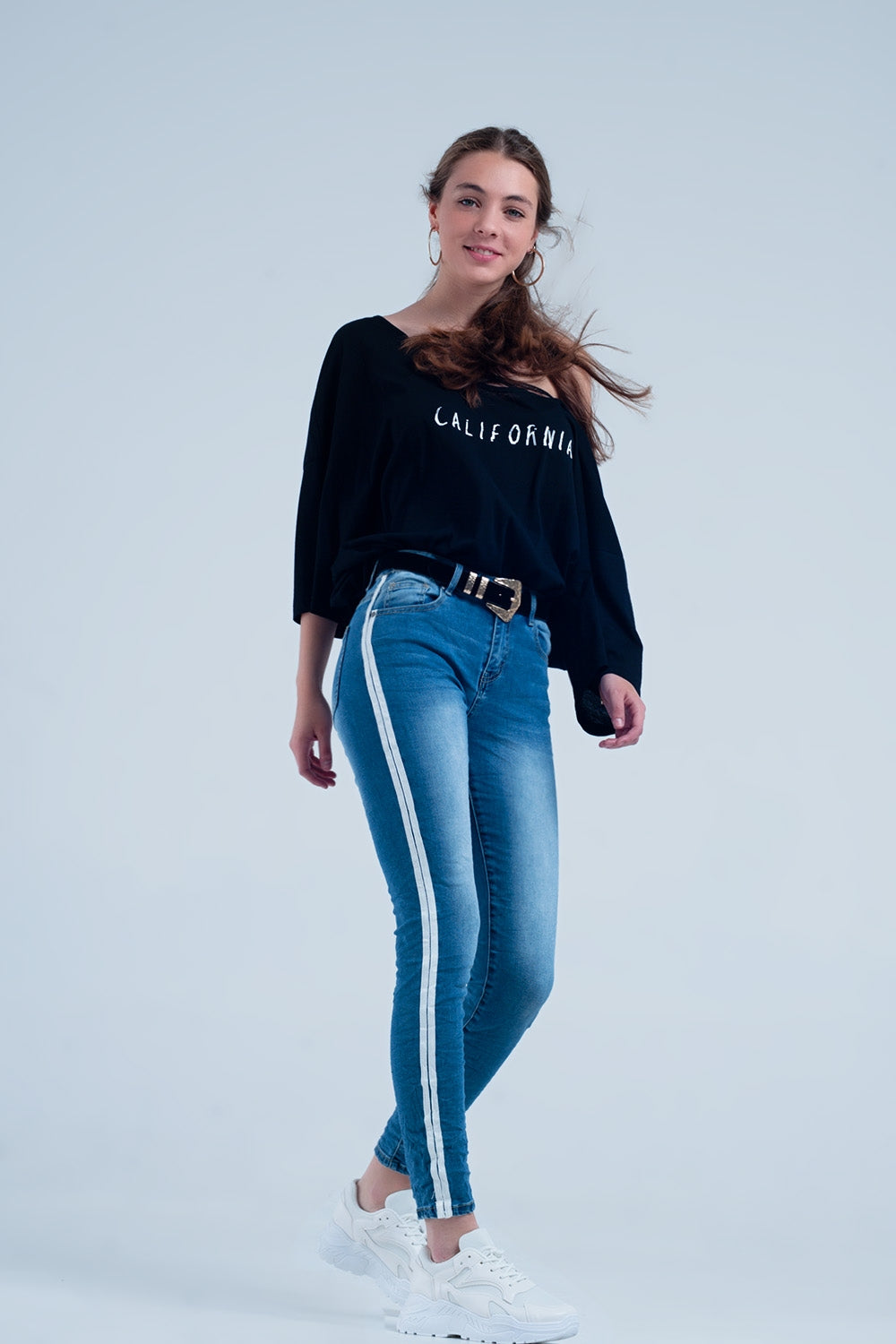Calças de ganga skinny com listras na costura lateral