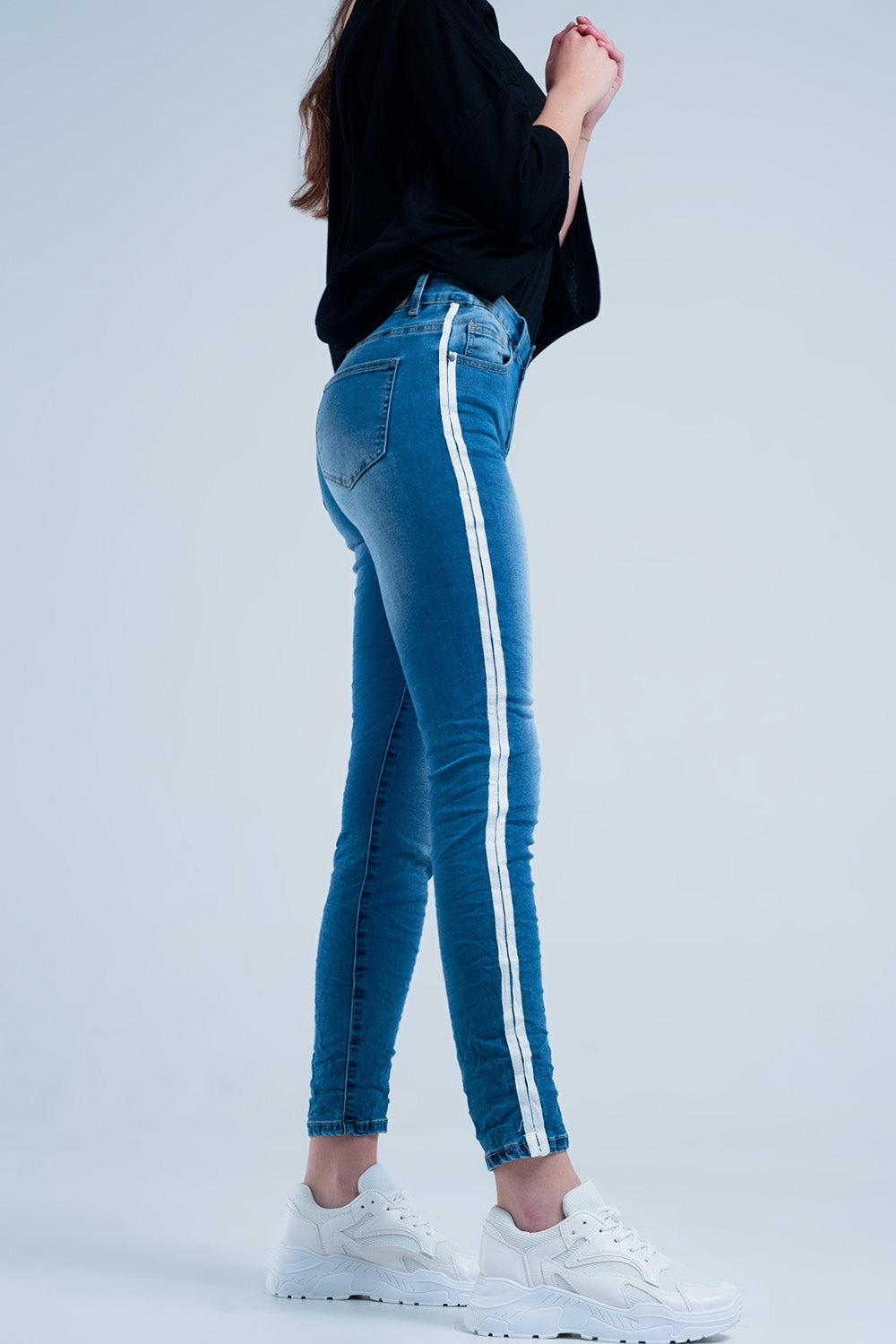 Calças de ganga skinny com listras na costura lateral
