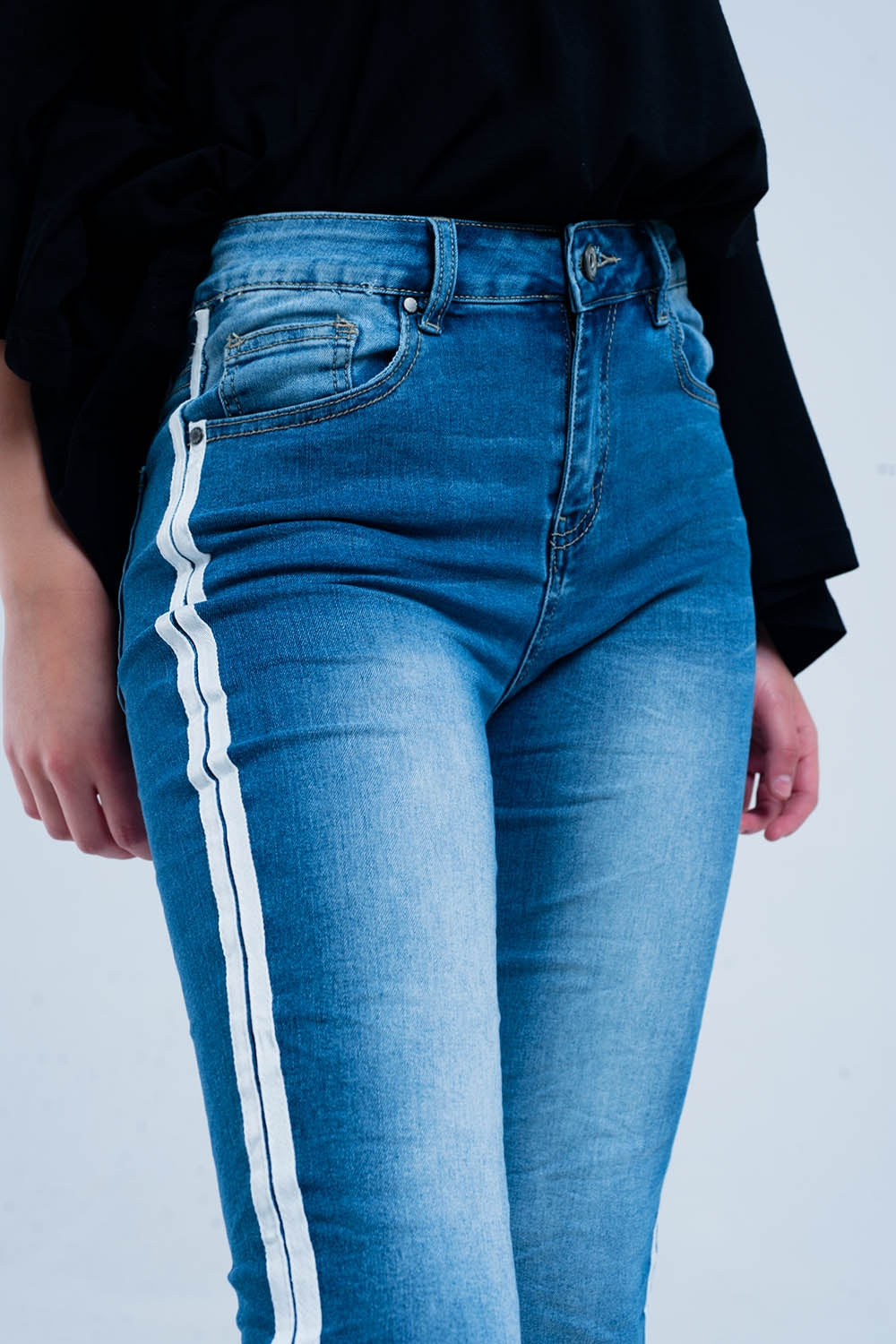 Calças de ganga skinny com listras na costura lateral