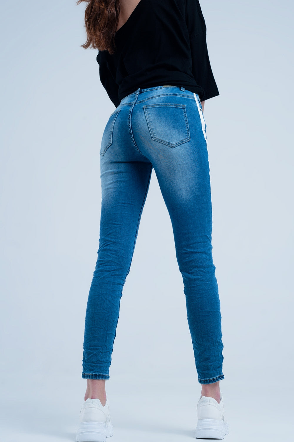 Calças de ganga skinny com listras na costura lateral
