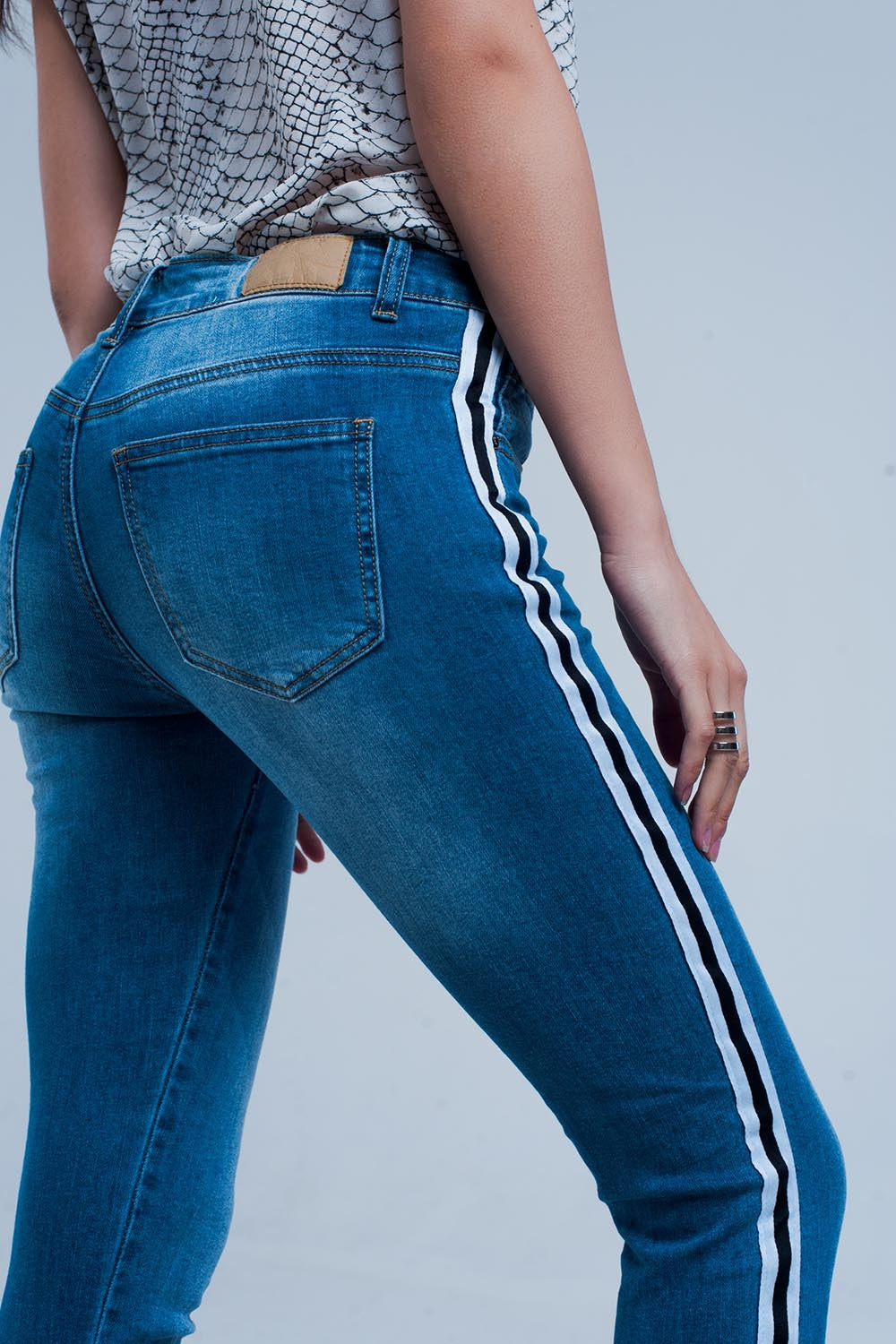 Calças de ganga denim com listra ao lado
