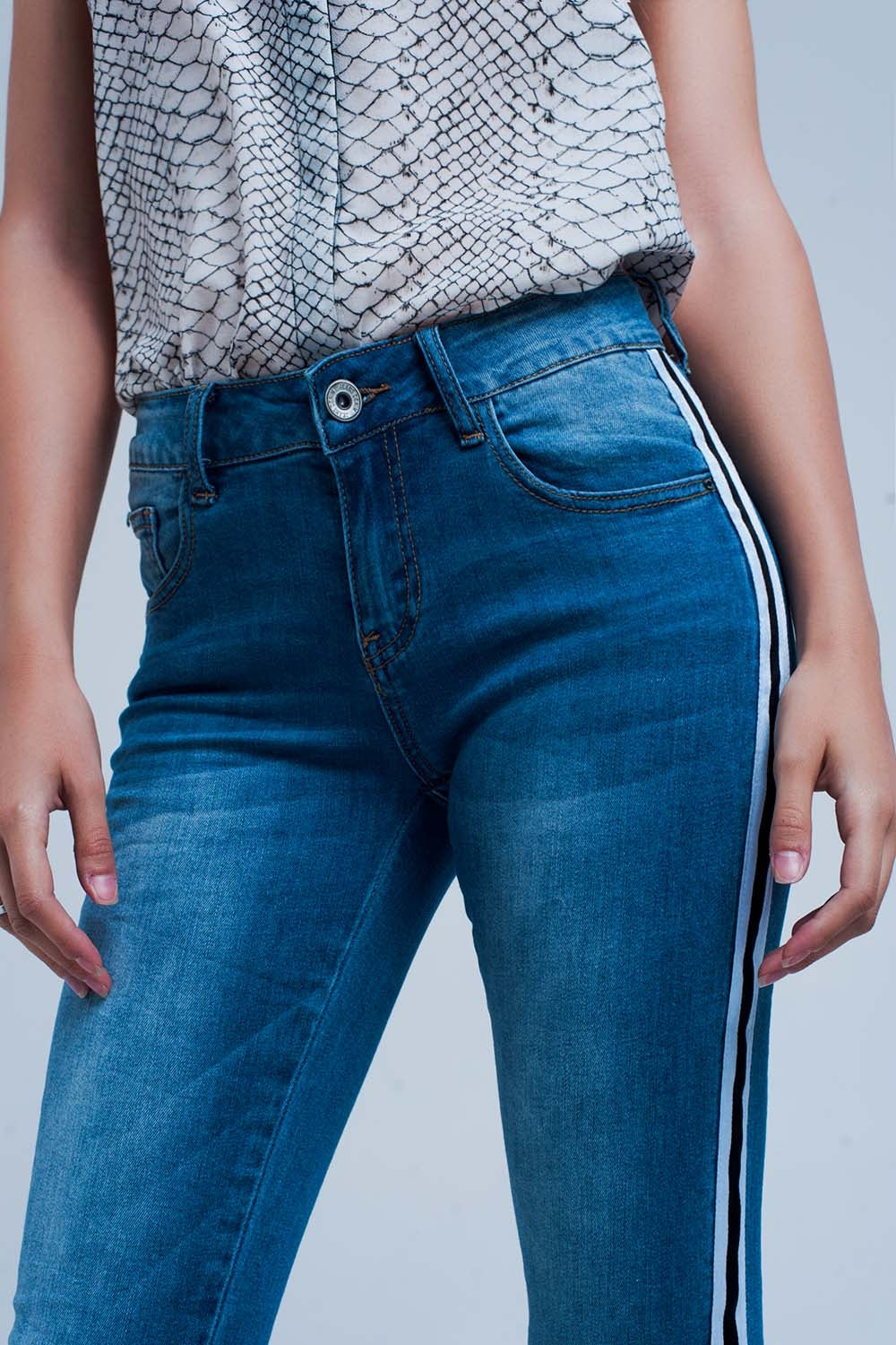Calças de ganga denim com listra ao lado
