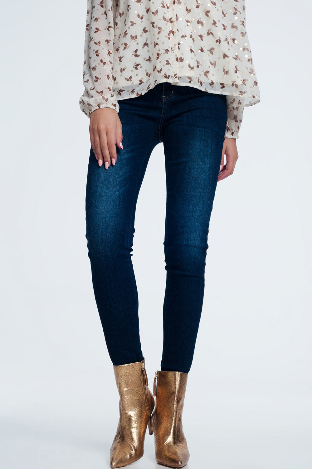 calças de ganga com detalhe linha lateral dourado