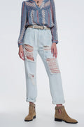 jeans rasgados boyfriend em azul claro