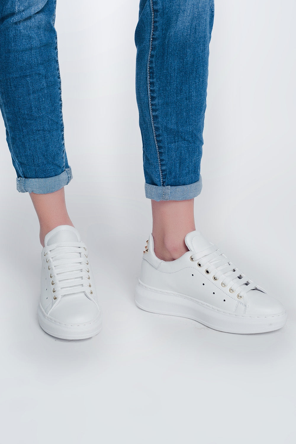 Jeans boyfriend com botões e médios lavados