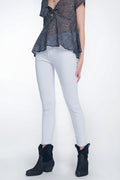 Calças skinny de cintura alta em branco