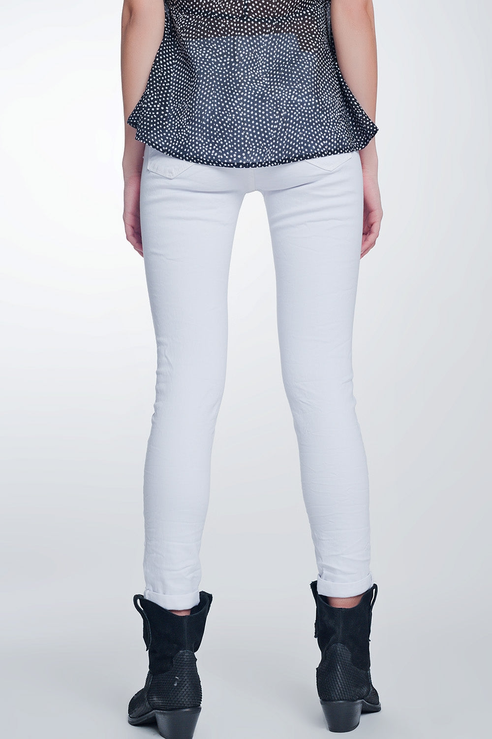 Calças skinny de cintura alta em branco