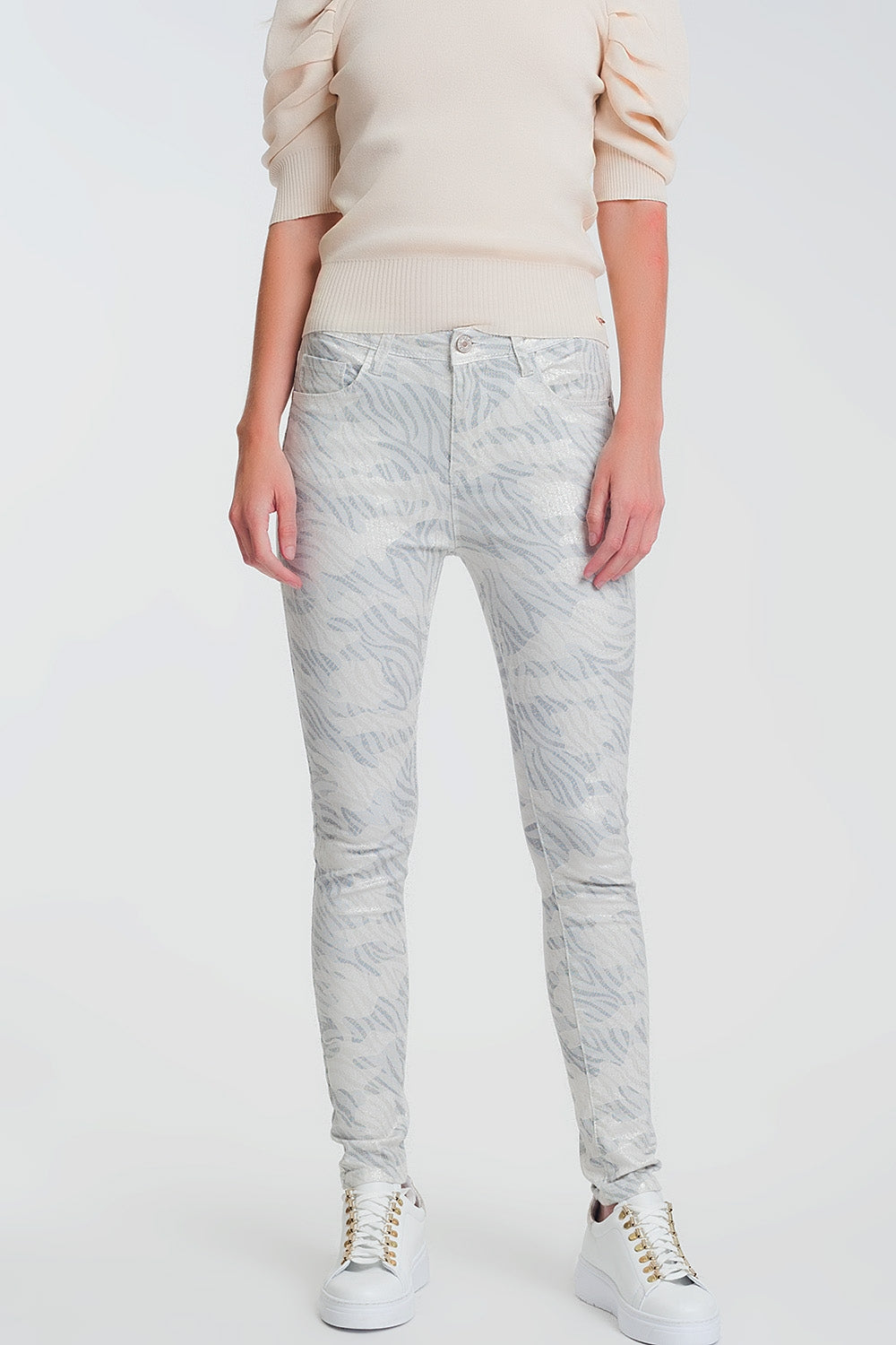 Calças super skinny com perneiras de camuflagem