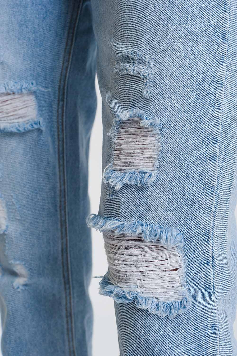 Jeans rasgados straight em denim claro