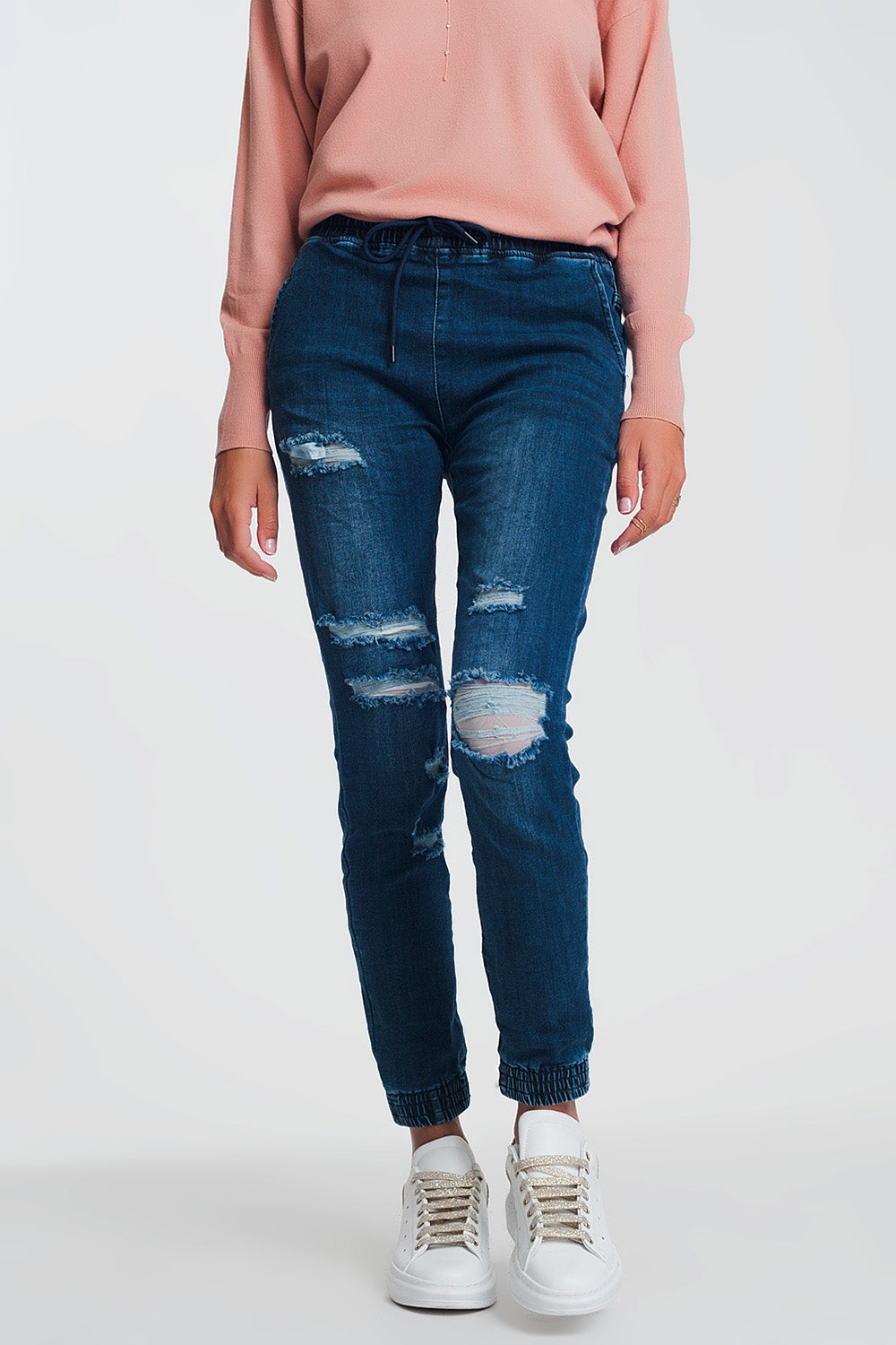 Calças de ganga estilo joggers em azul escuro